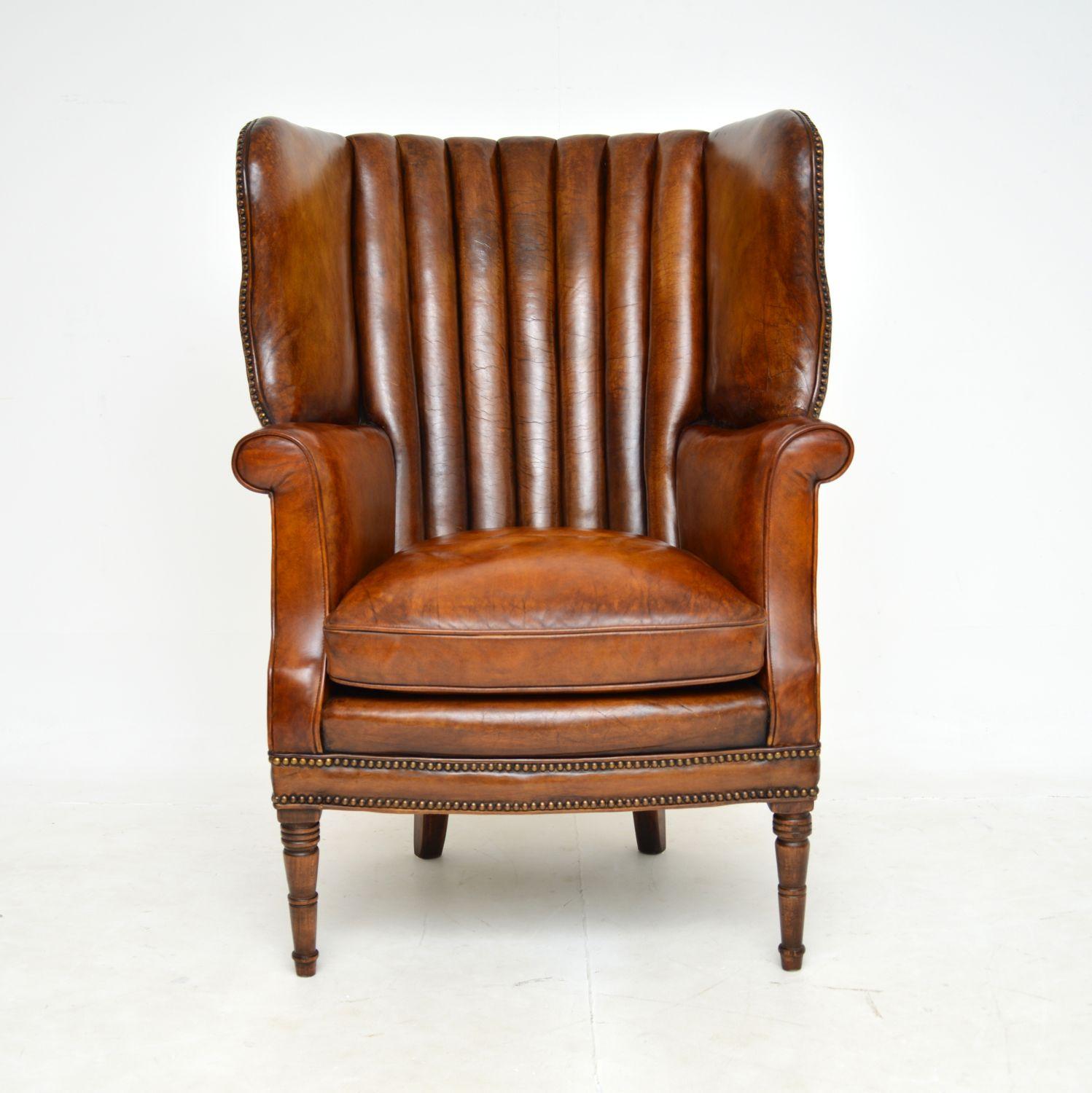 A magnificent antique Georgian period ribbed barrel back armchair in leather. This was made in England & we would date it from around the 1790-1810 period.

This is an incredibly fine example, the quality is superb and it is very comfortable. The