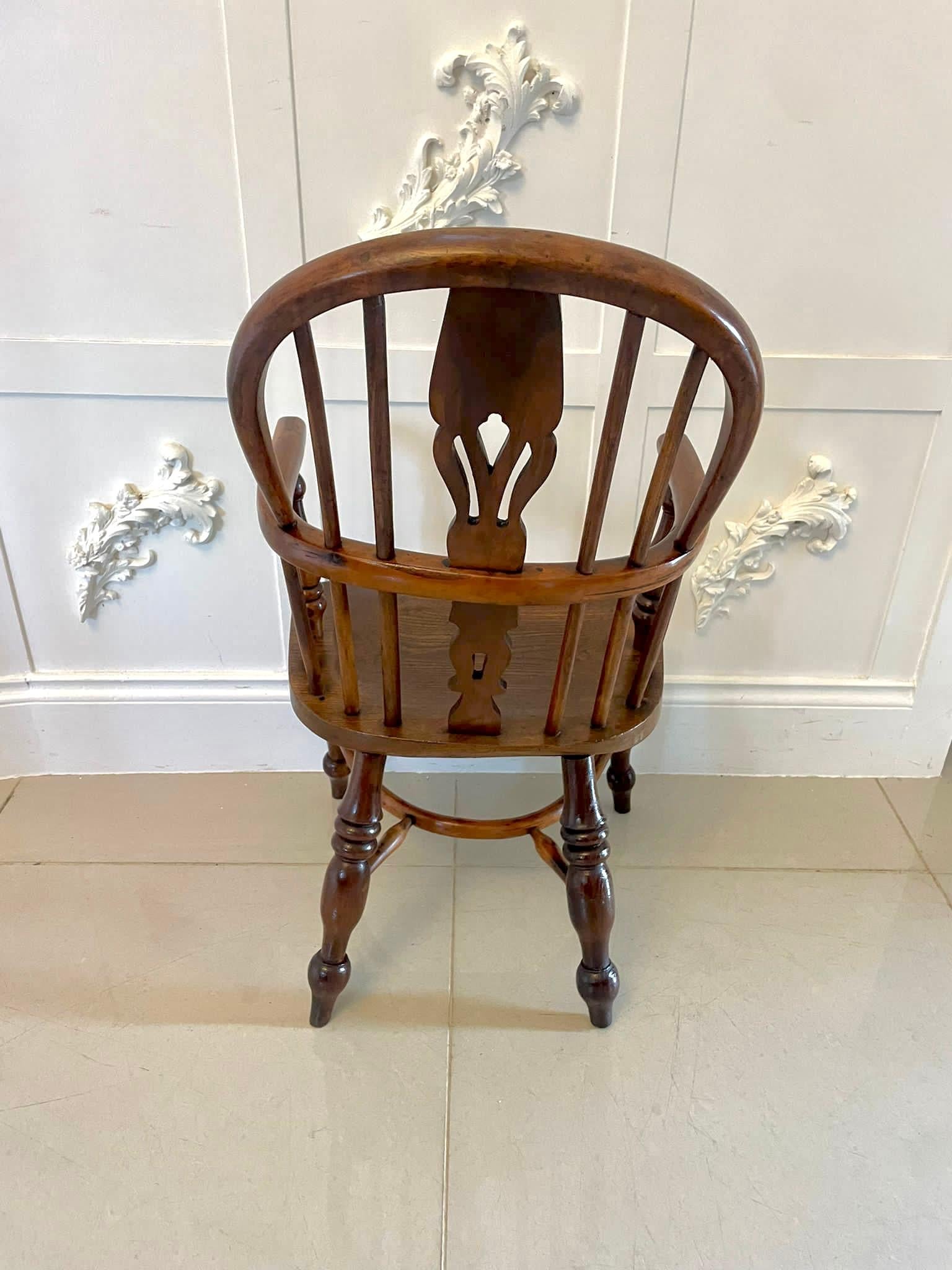 Antique George III Child’s yew wood Windsor armchair having a yew wood shaped back, turned spindles and a shaped splat, elm seat standing on turned legs united by a yew wood crinoline stretcher 


A charming example in lovely original