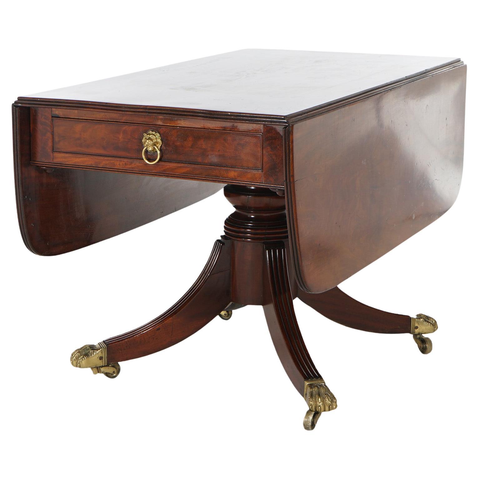 Antique George III Flame Mahogany Drop Leaf Table with Brass Claw Feet C1820 For Sale