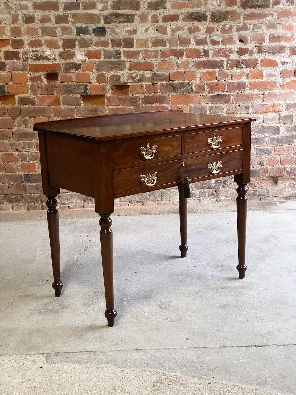 Elegant early 19th century George III Gillows attributed Cuban mahogany ‘Low Boy’ side table Secretaire with stamped Cope & Collinson brass locks circa 1820, the rectangular top over two short drawers and one long drawer incorporating a secretaire