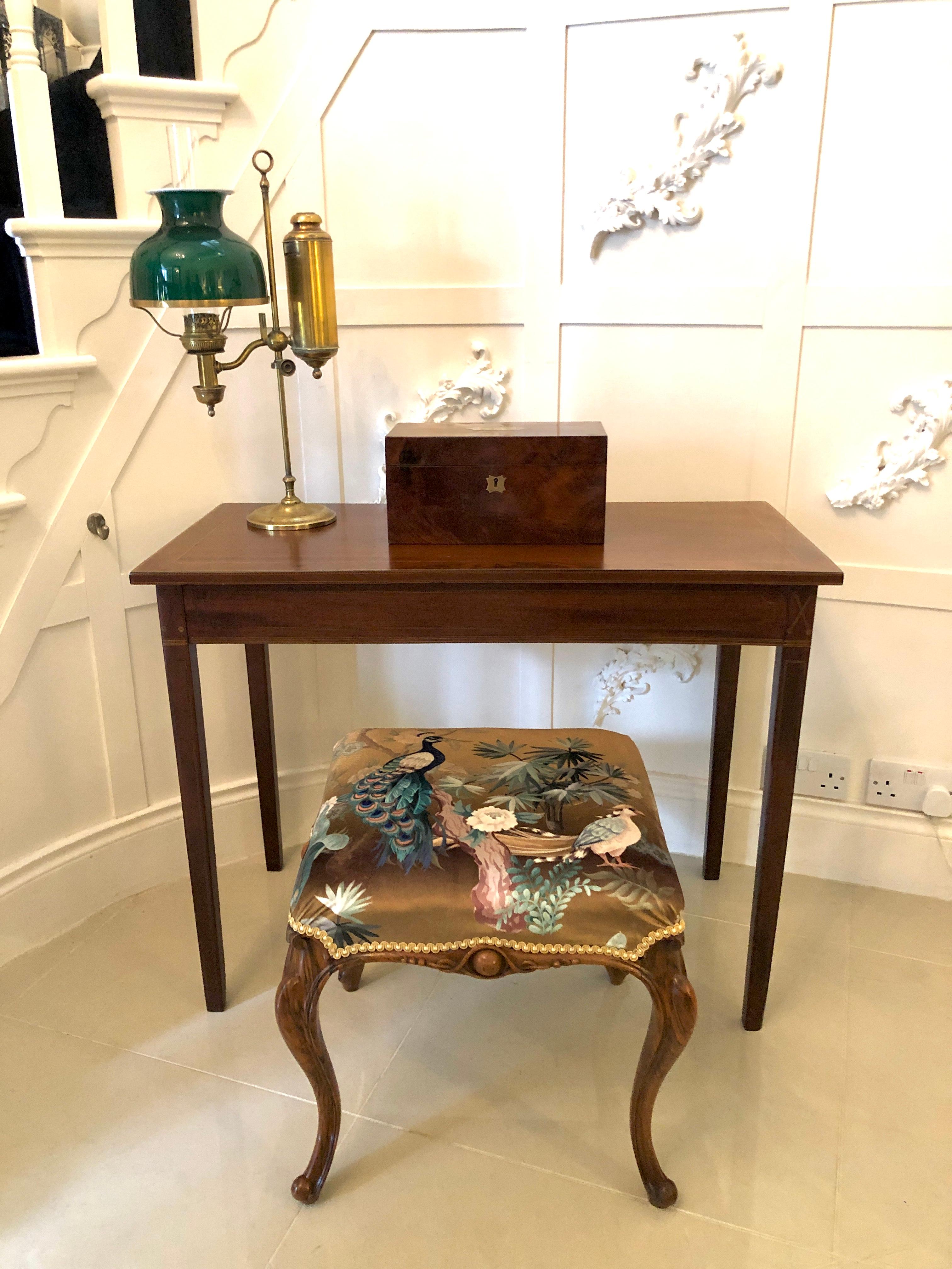 Antique George III mahogany side table having a spectacular mahogany inlaid top with boxwood stringing and an impressive inlaid mahogany frieze standing on four square inlaid mahogany tapering legs.

WORLDWIDE SHIPPING

We are able to ship this item