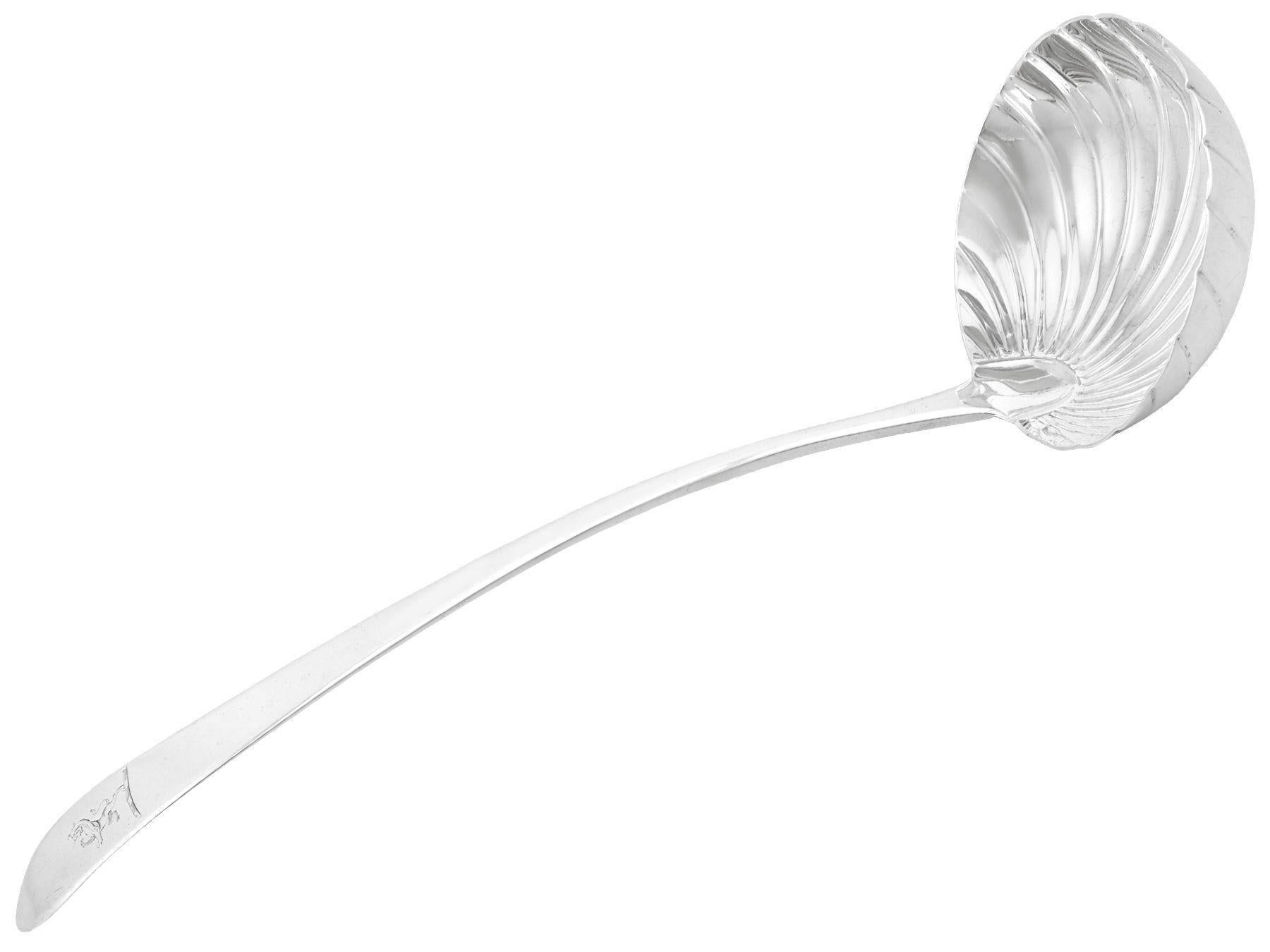 An exceptional, fine and impressive antique George III Irish sterling silver soup ladle; an addition to our silver cutlery collection

This exceptional George III Irish sterling silver ladle has a shell shaped bowl.

The anterior surface of the