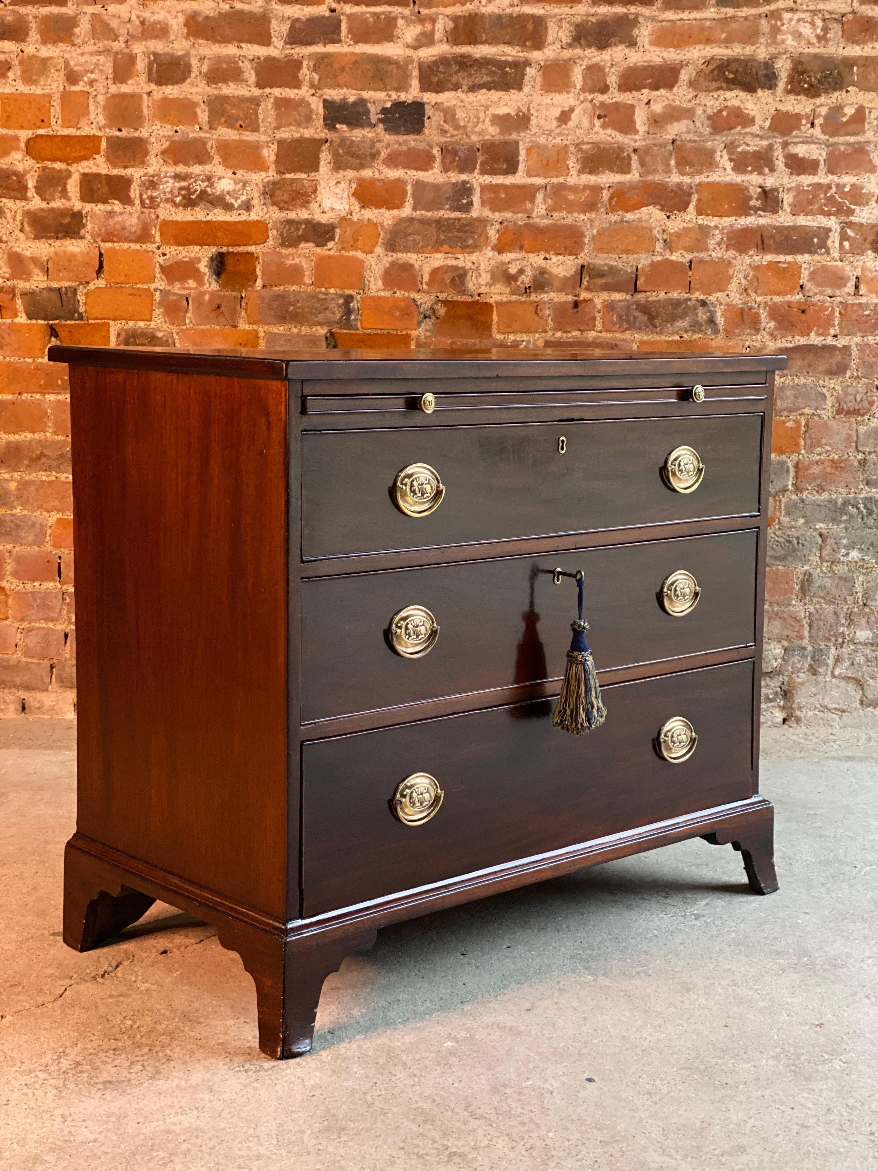 Antique George III mahogany bachelor’s chest of drawers 19th century, circa 1830

Early 19th century George III mahogany bachelor’s chest of drawers circa 1830, the rectangular top with shaped moulded edge, over three graduated drawers with hand