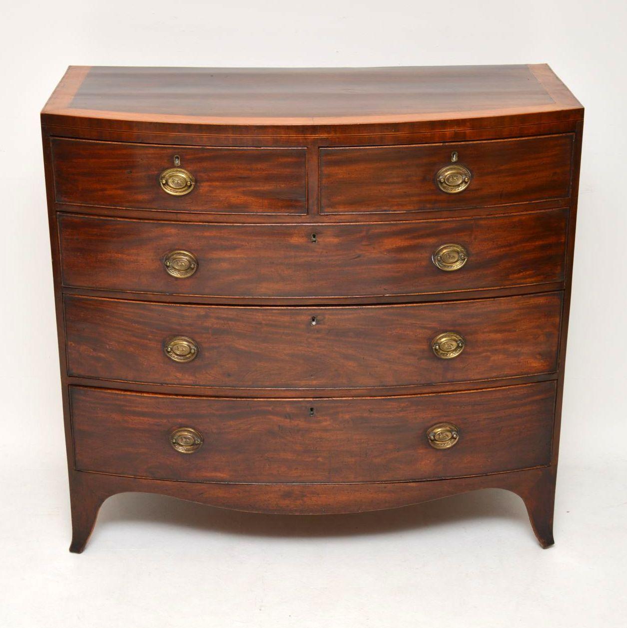 Antique George III mahogany bow fronted chest of drawers in good original condition & with a lot of character. Please enlarge all the images to see the overall condition of the surface, because there will be various marks & indentations, due to the