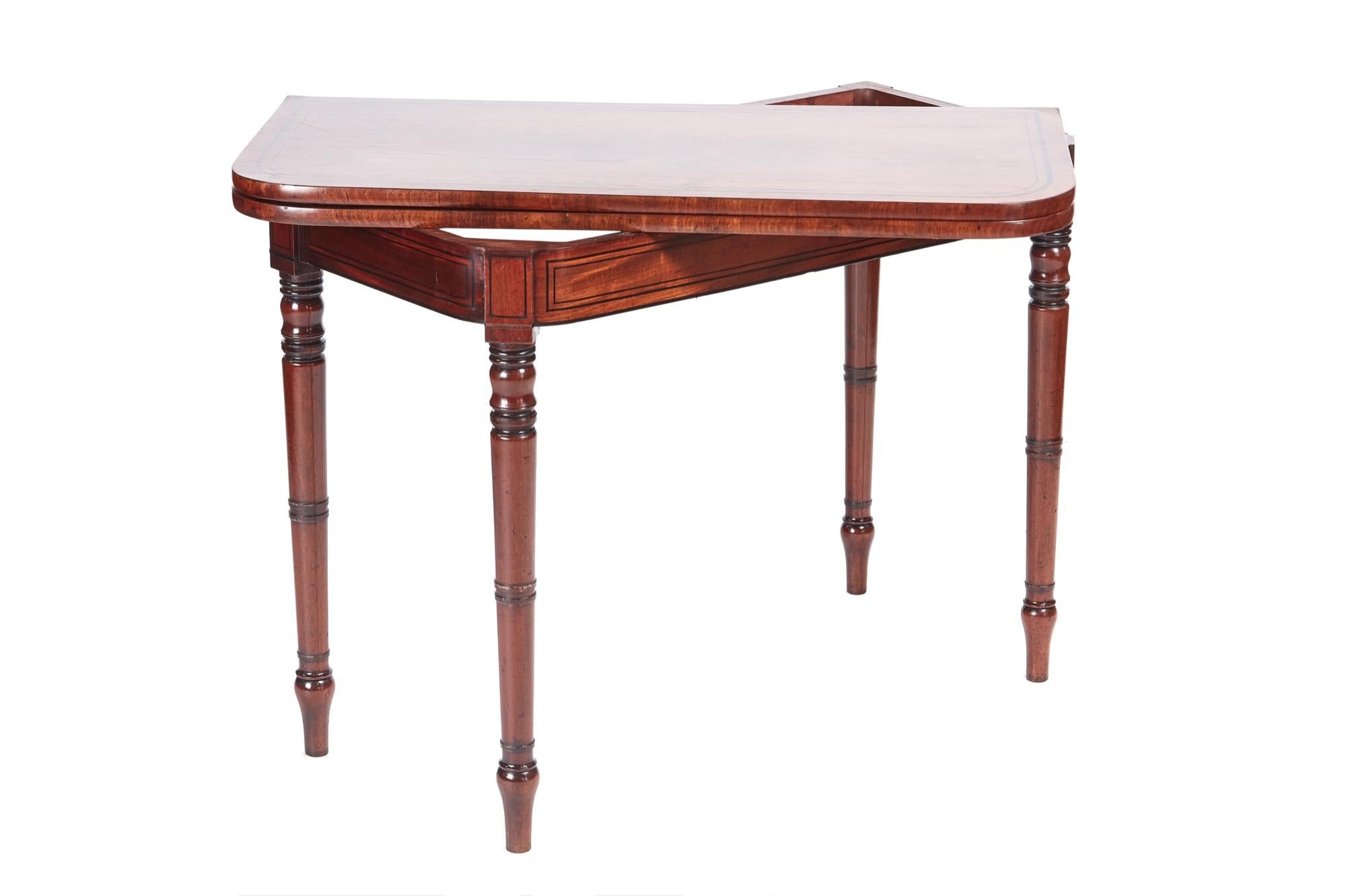 This is an antique George III antique mahogany card/side table with the loveliest inlaid mahogany top, original green baize and inlaid frieze. It stands on four elegantly turned legs.

A delightful piece in the finest condition.

WORLDWIDE