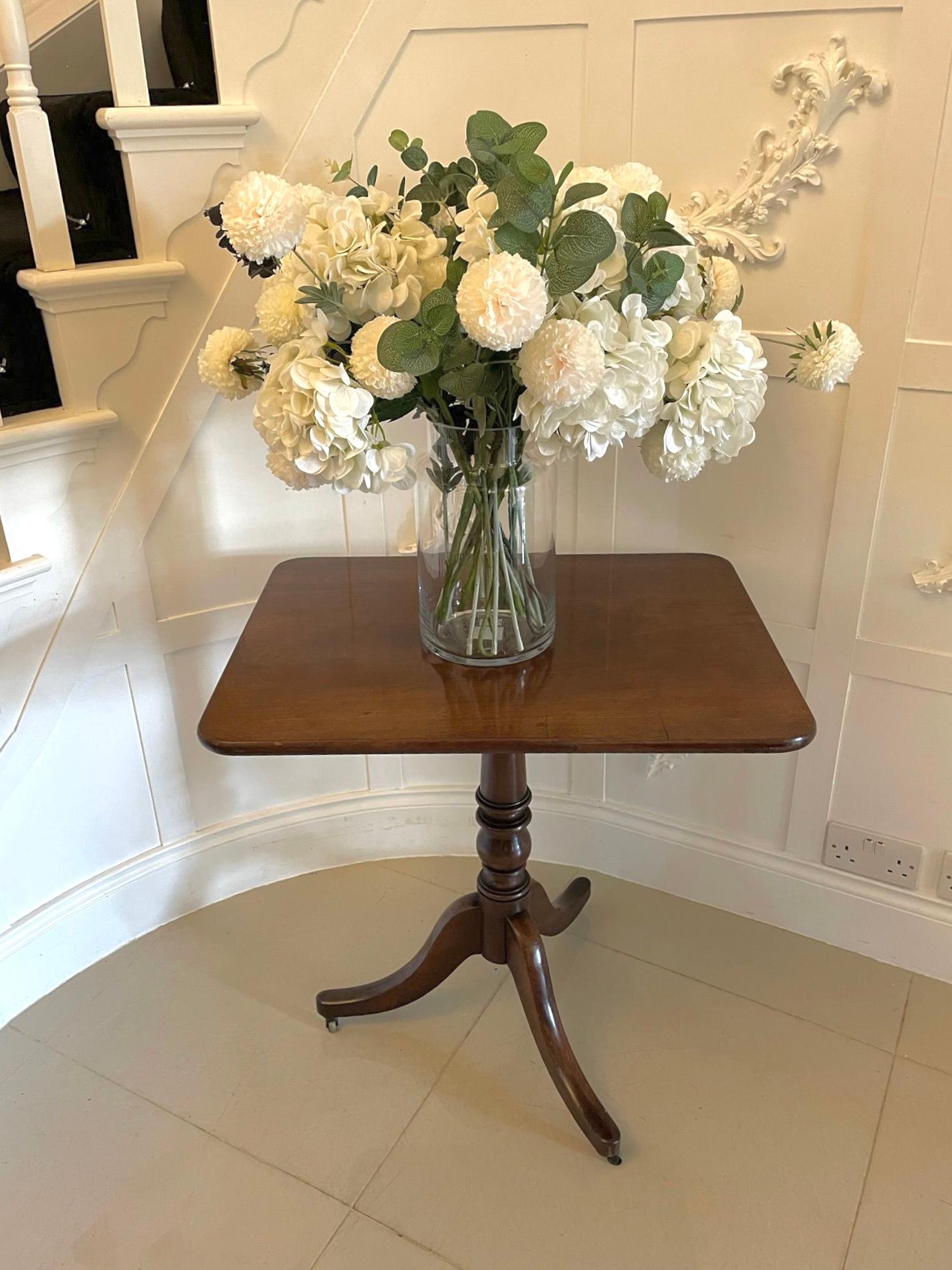 Antique George III mahogany table having a lovely rectangular mahogany top supported by an elegant shaped turned column standing on three mahogany shaped sabre legs.

A lovely example in its original condition having a desirable colour and
