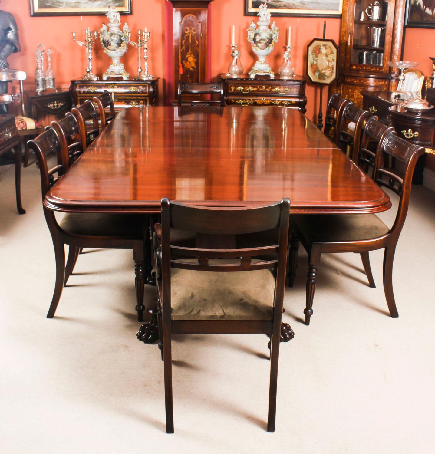 This is a beautiful dining set comprising an antique George III flame mahogany twin pedestal dining table circa 1810 in date and ten bespoke Regency style tulip back dining chairs.

The amazing table can sit ten people in comfort and will stretch