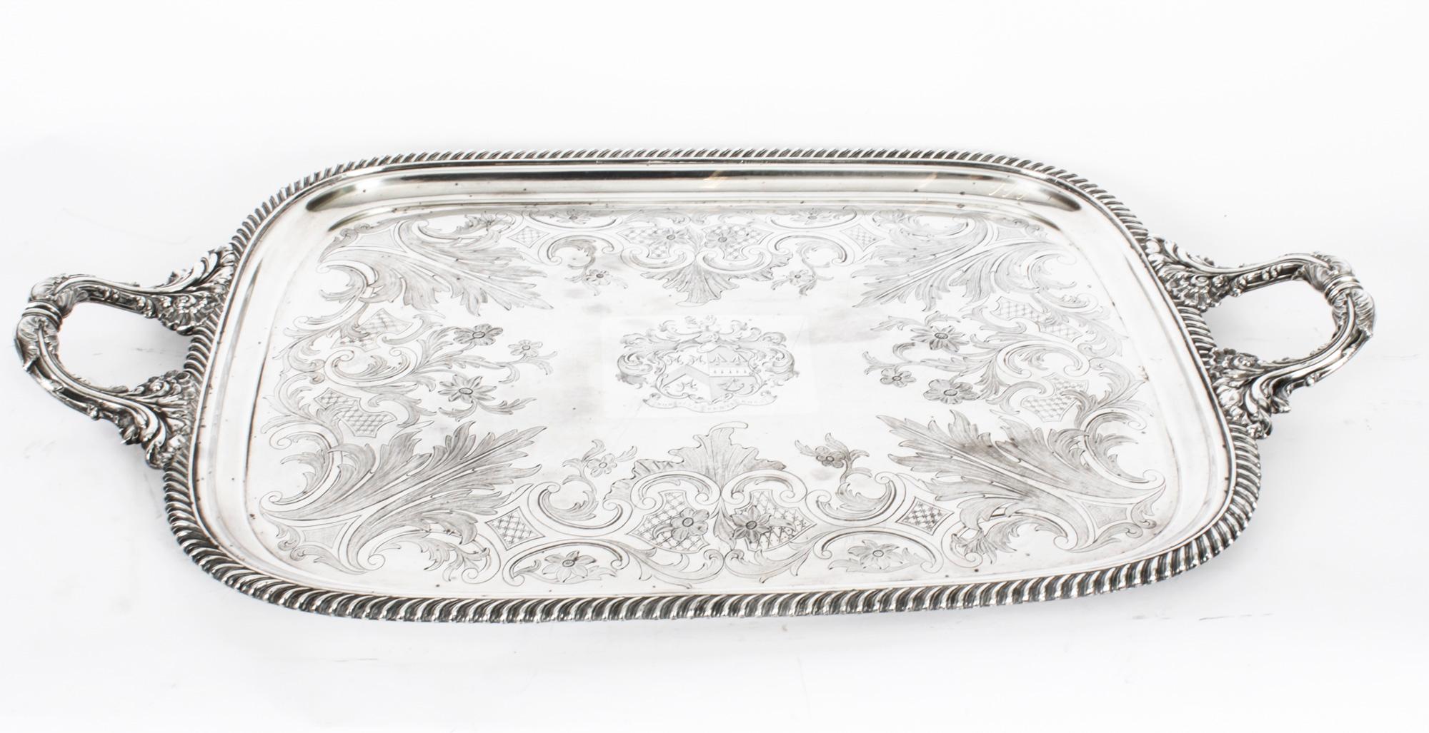 This is a lovely antique English old Sheffield silver plate tray C1790 in date.
 
This rectangular Old Shefield tray features a deep set, decorative fluted border with elegant handles decorated with acathus leaves to each end, superb foliate and