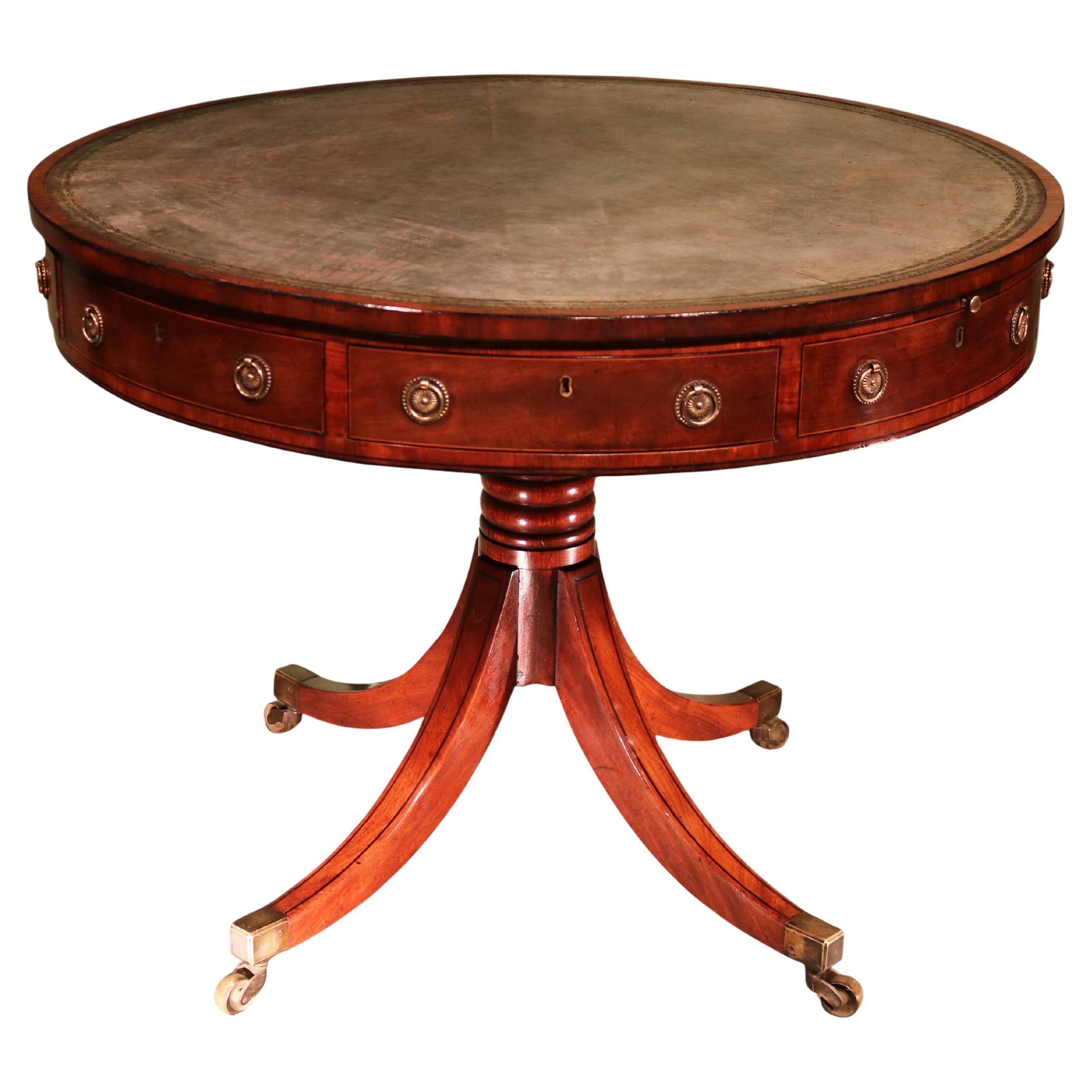 Antique George III period mahogany and satinwood drum table
