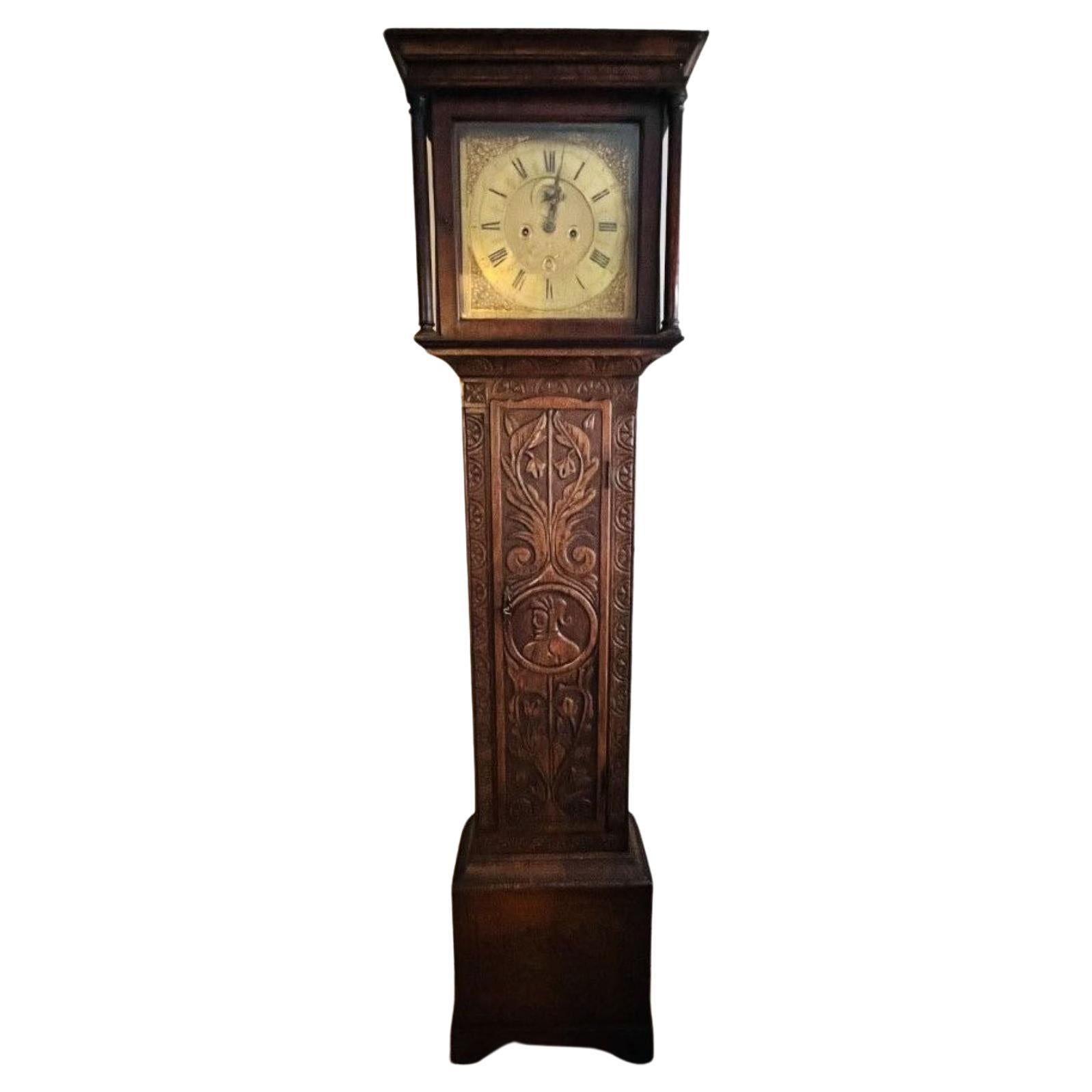 Antique George III quality carved oak brass face longcase clock