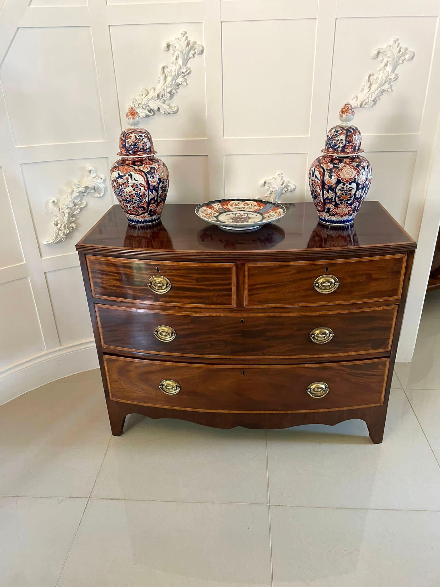 Antique George III quality figured mahogany inlaid bow front chest of 4 drawers having a quality figured mahogany bow front top crossbanded in satinwood and a reeded edge above two short and two long figured mahogany oak lined bow fronted drawers