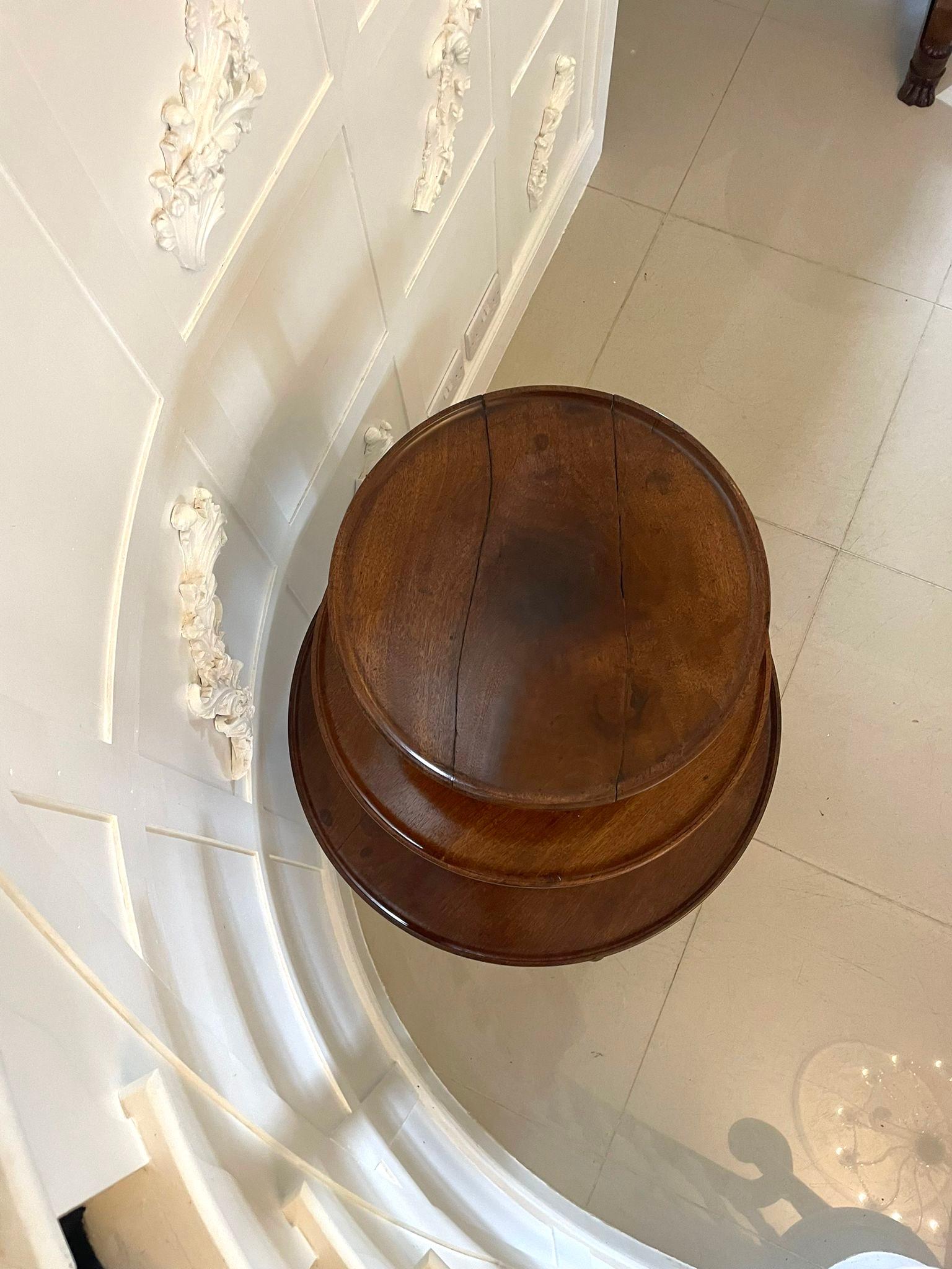 Antique George III quality mahogany 3 tier circular dumb waiter having 3 circular quality mahogany display tiers supported by turned columns standing on 3 shaped cabriole legs with pad feet original brass castors


Dimensions:
Height 108 cm (42.52