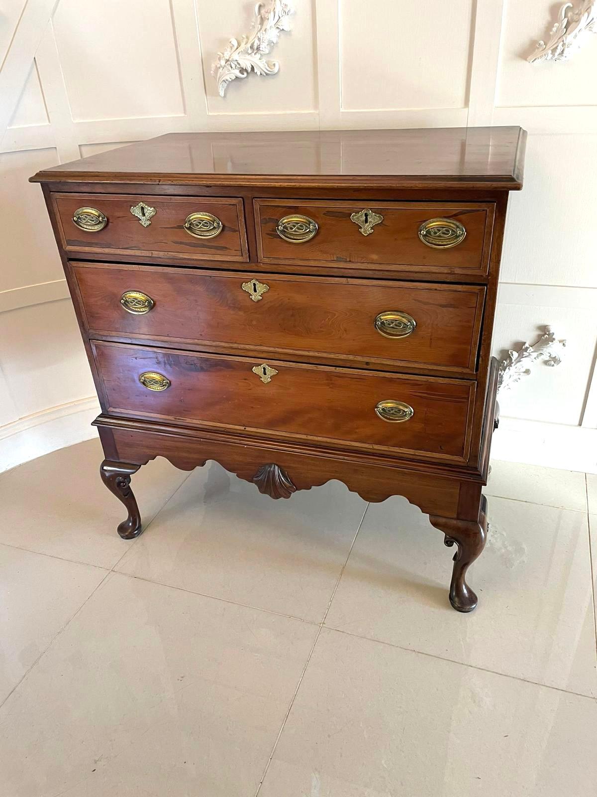 Antique George III quality mahogany chest on stand having a quality mahogany rectangular top with a moulded edge above two short over two long drawers crossbanded in satinwood with original oval ornate brass handles and engraved brass escutcheons.
