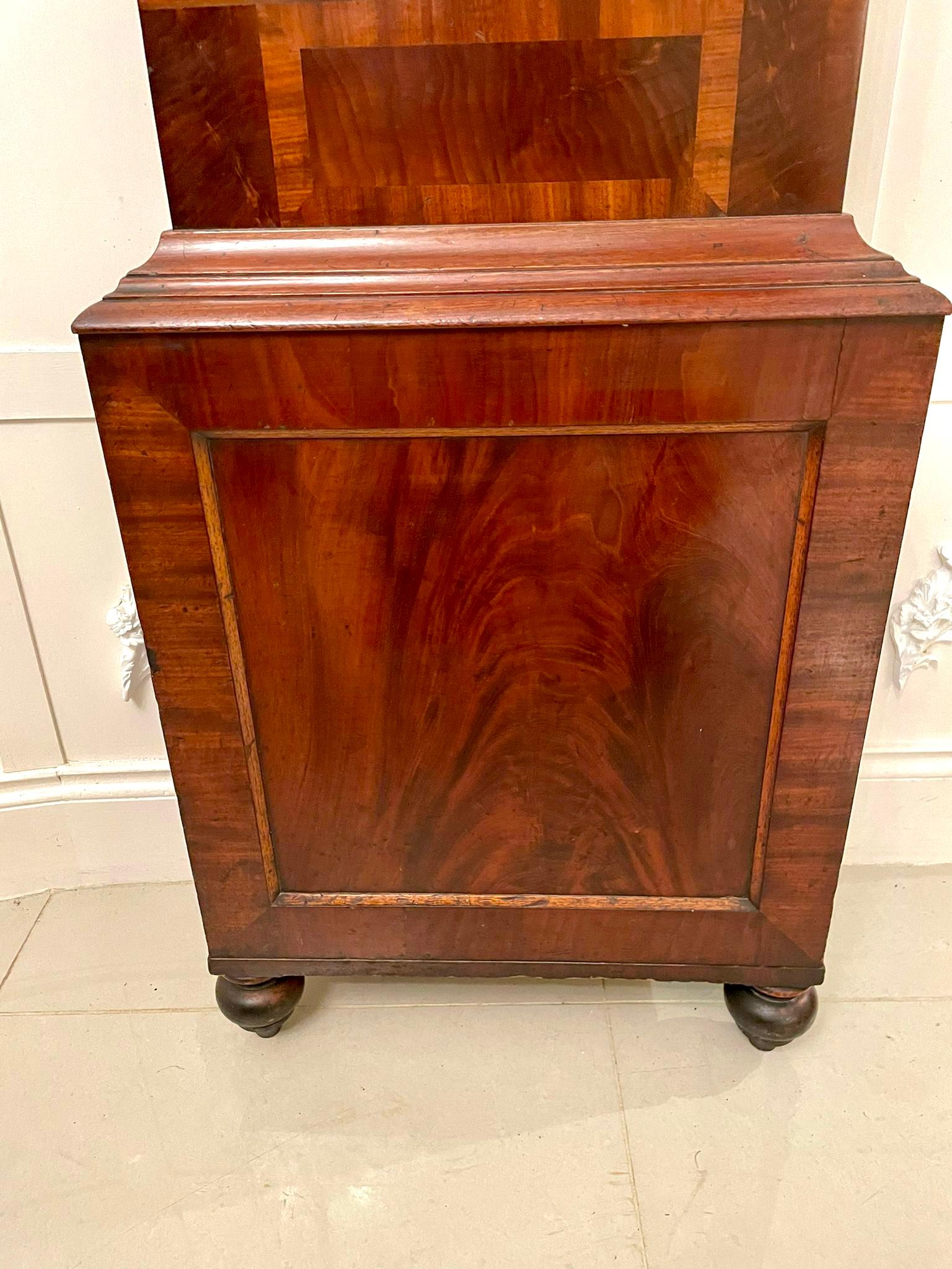 Antique George III quality mahogany eight day longcase clock having a fantastic quality mahogany case with an arched shaped door flanked by reeded turned columns, quality painted arched shaped dial with original hands, second and date dials, eight