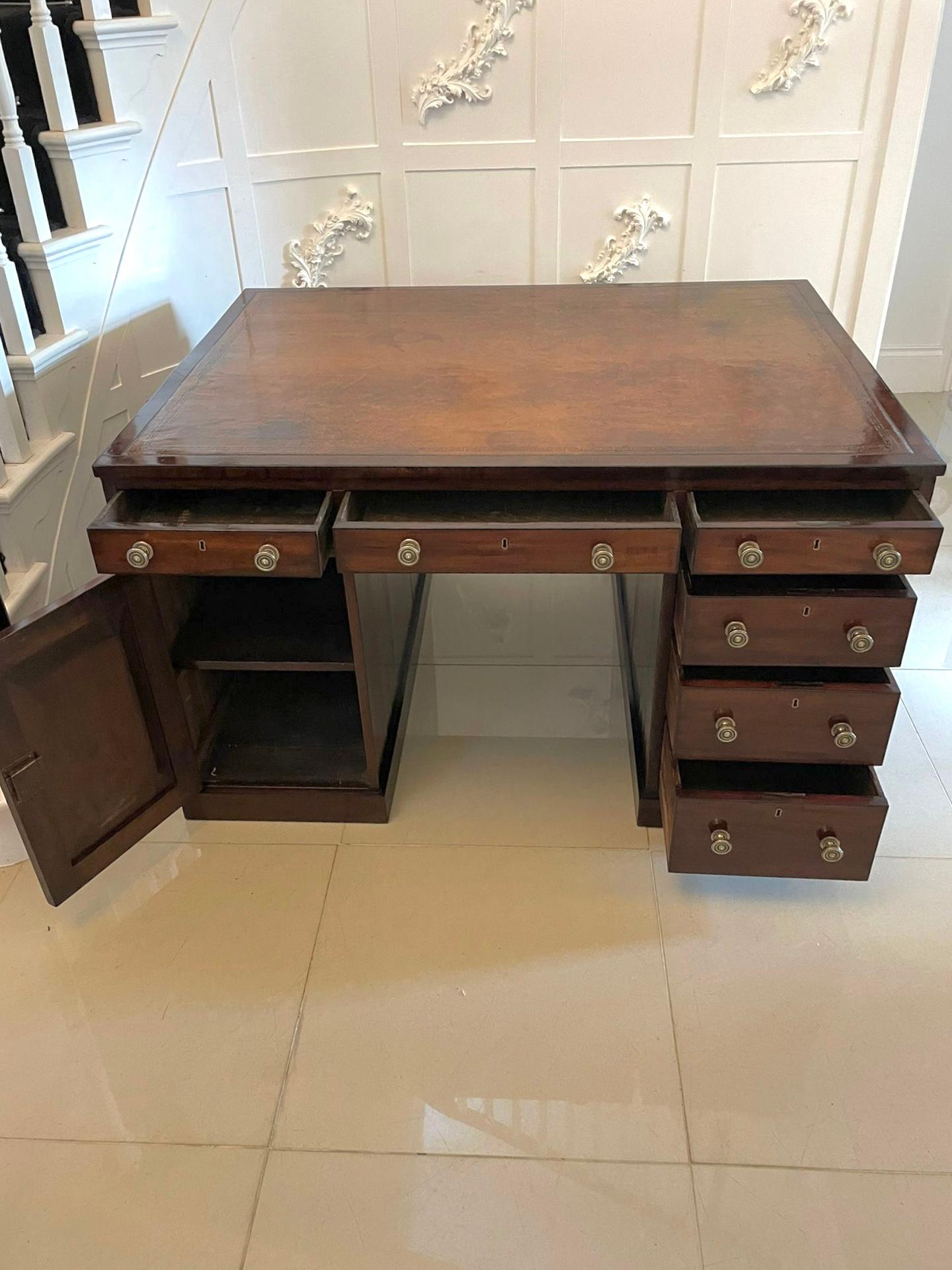 Antique George III quality mahogany partners desk having a quality original tan coloured leather top crossbanded in mahogany with ebony inlay stringing above six frieze drawers above two pedestals each one with three working mahogany lined drawers