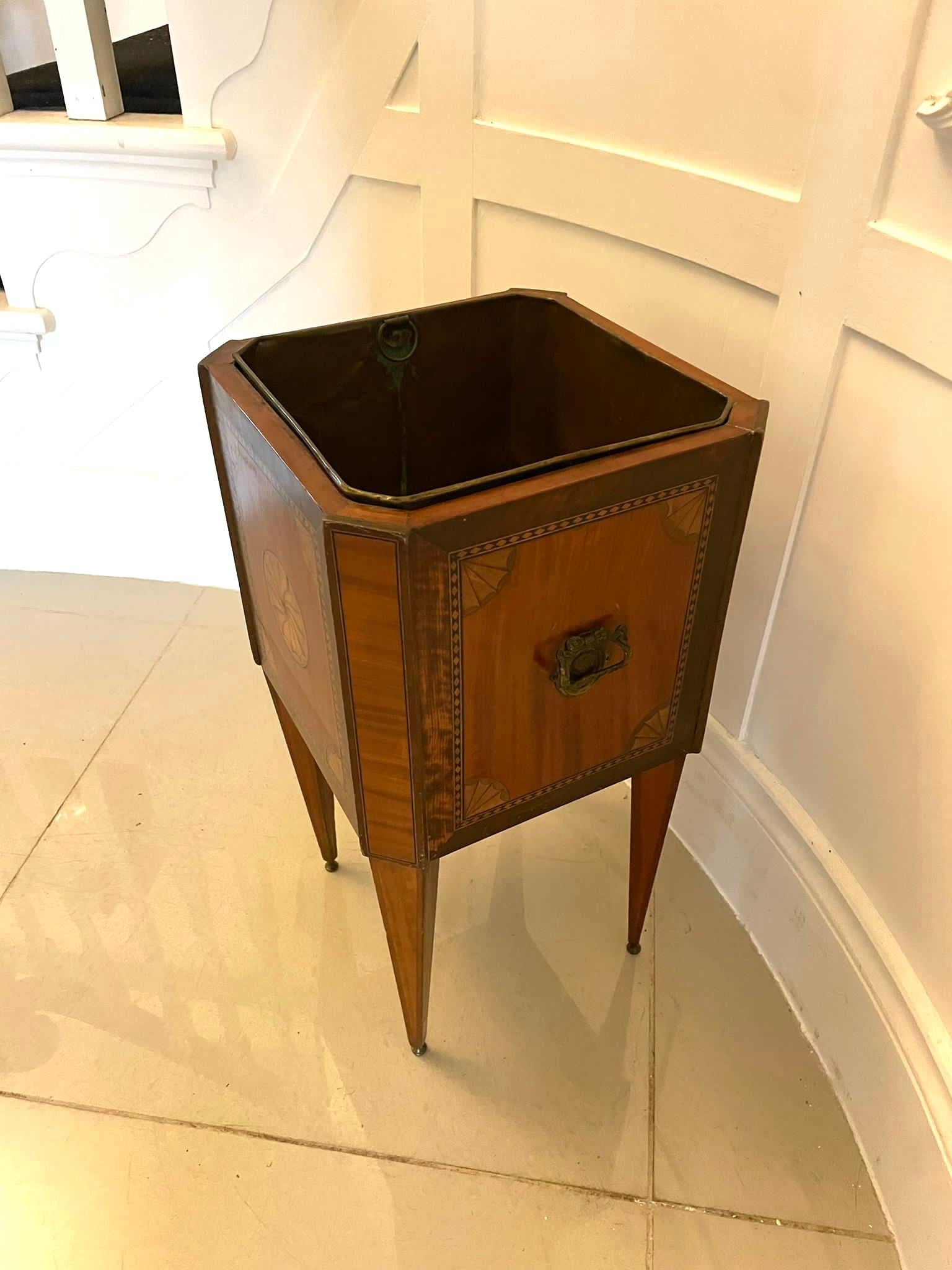 Antique George III quality satinwood inlaid freestanding champagne/wine cooler having a quality satinwood inlaid freestanding champagne cooler with pretty satinwood inlaid shells, original ornate brass carrying handles and brass liner standing on