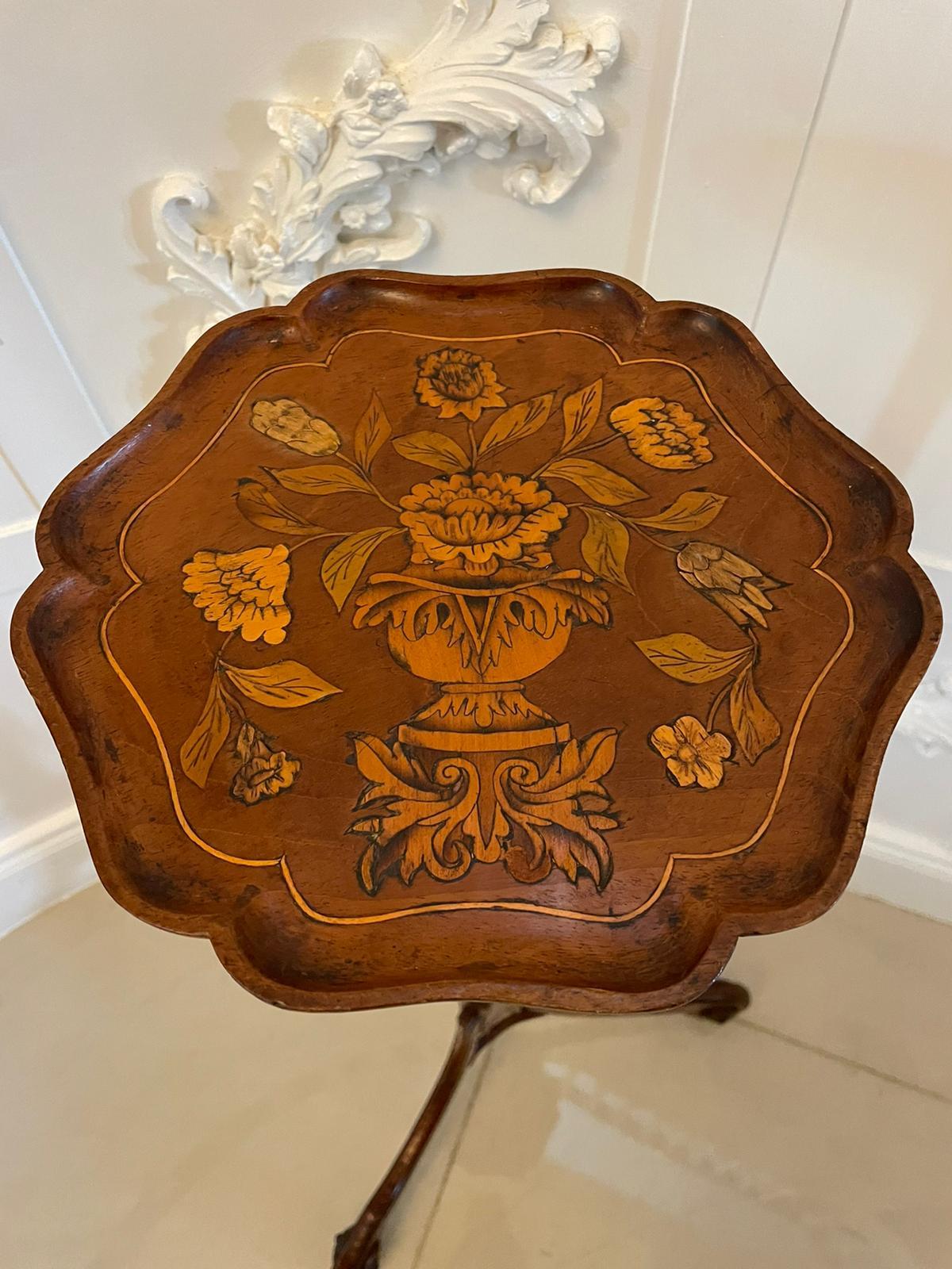 Antique George III quality walnut floral marquetry inlaid candle stand having a quality walnut shaped top with pretty inlaid floral marquetry supported by a turned tapering shaped walnut column with floral marquetry inlay standing on three elegant