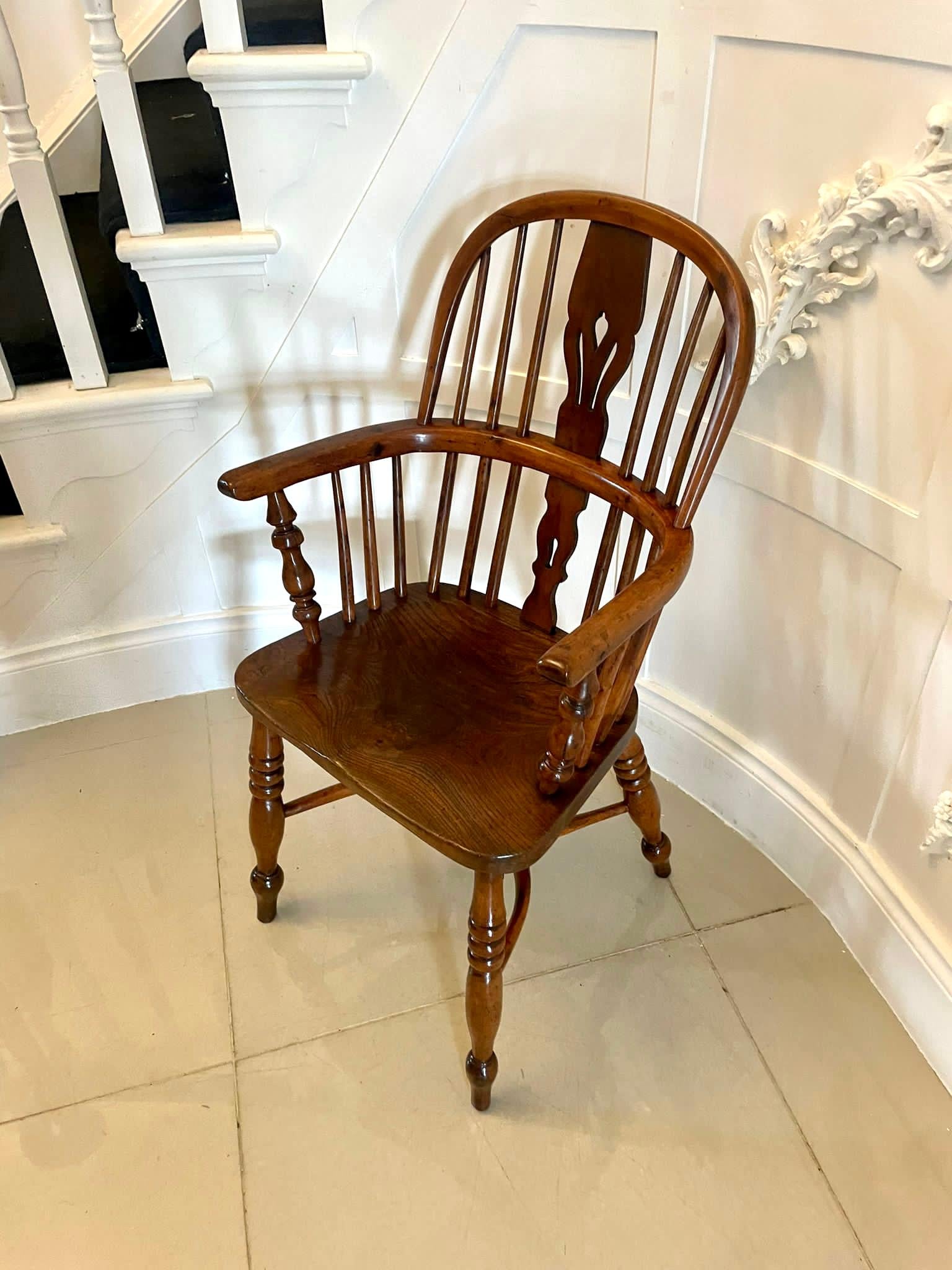 Antique George III quality yew wood Windsor armchair having a yew wood shaped back, turned spindles, shaped splat, elm seat standing on turned legs united by a yew wood crinoline stretcher


A wonderful example in lovely original