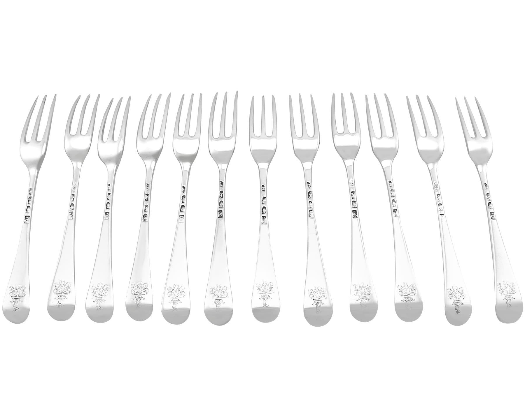 An exceptional, fine and impressive set of twelve antique Georgian sterling silver Hanoverian pattern table forks; an addition to our Georgian flatware collections.

These exceptional antique Georgian straight* sterling silver forks have been
