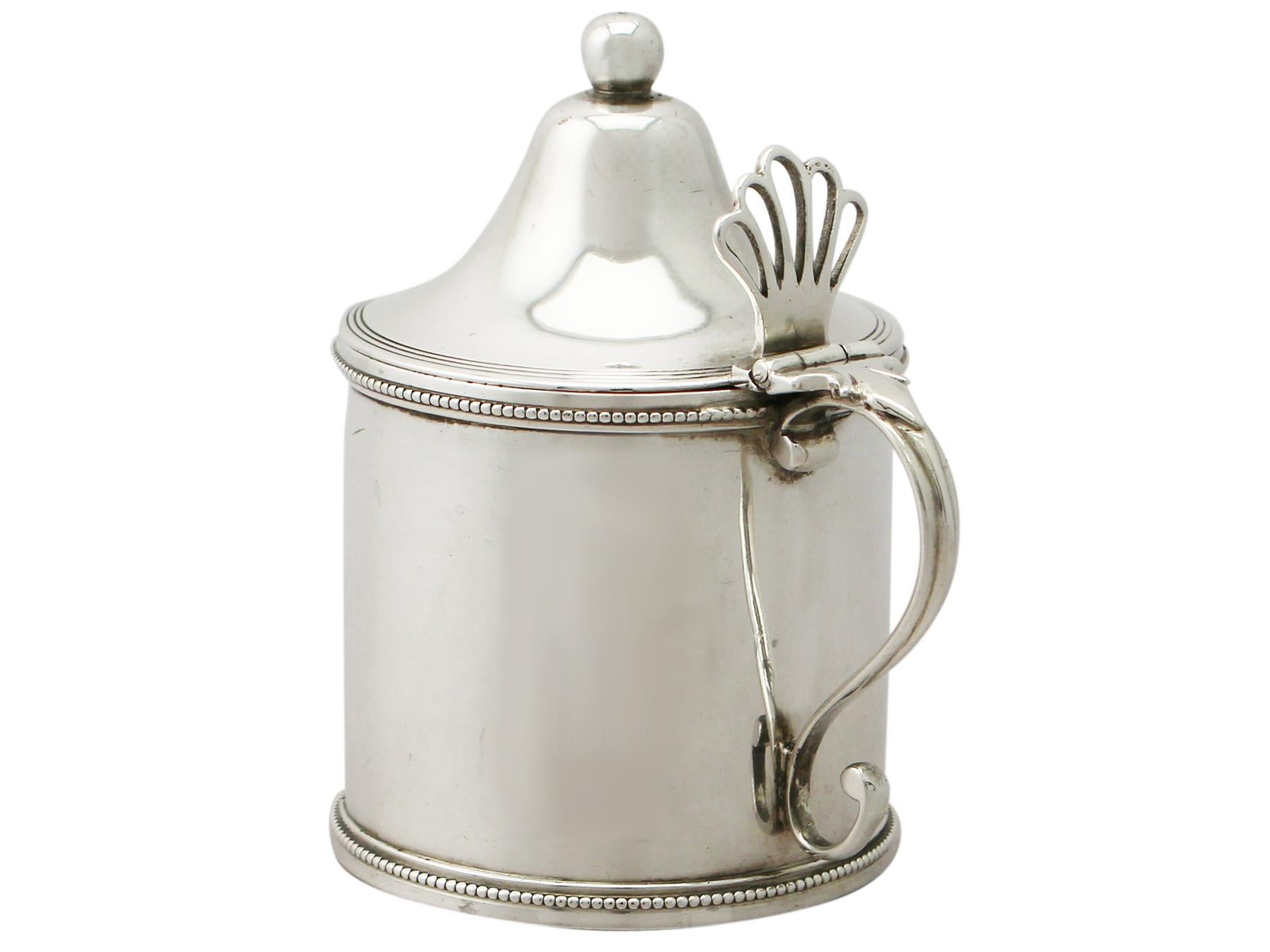 An exceptional, fine and impressive antique George III English sterling silver mustard pot made by Peter and Ann Bateman; an addition to our Georgian silver condiments collection.

This exceptional antique George III sterling silver mustard pot