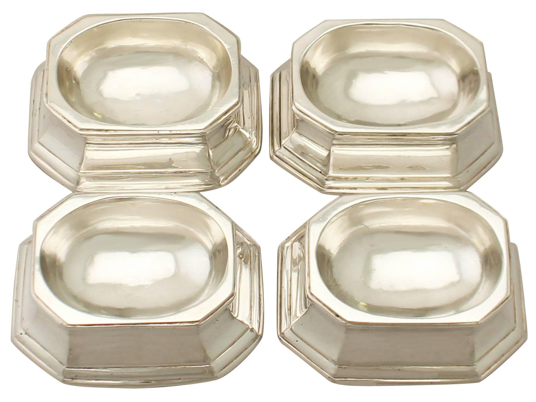 An exceptional, fine and impressive set of four antique Georgian English cast sterling silver trencher salts, part of our silver cruet and condiments collection

These exceptional antique George III sterling silver trencher salts have a plain
