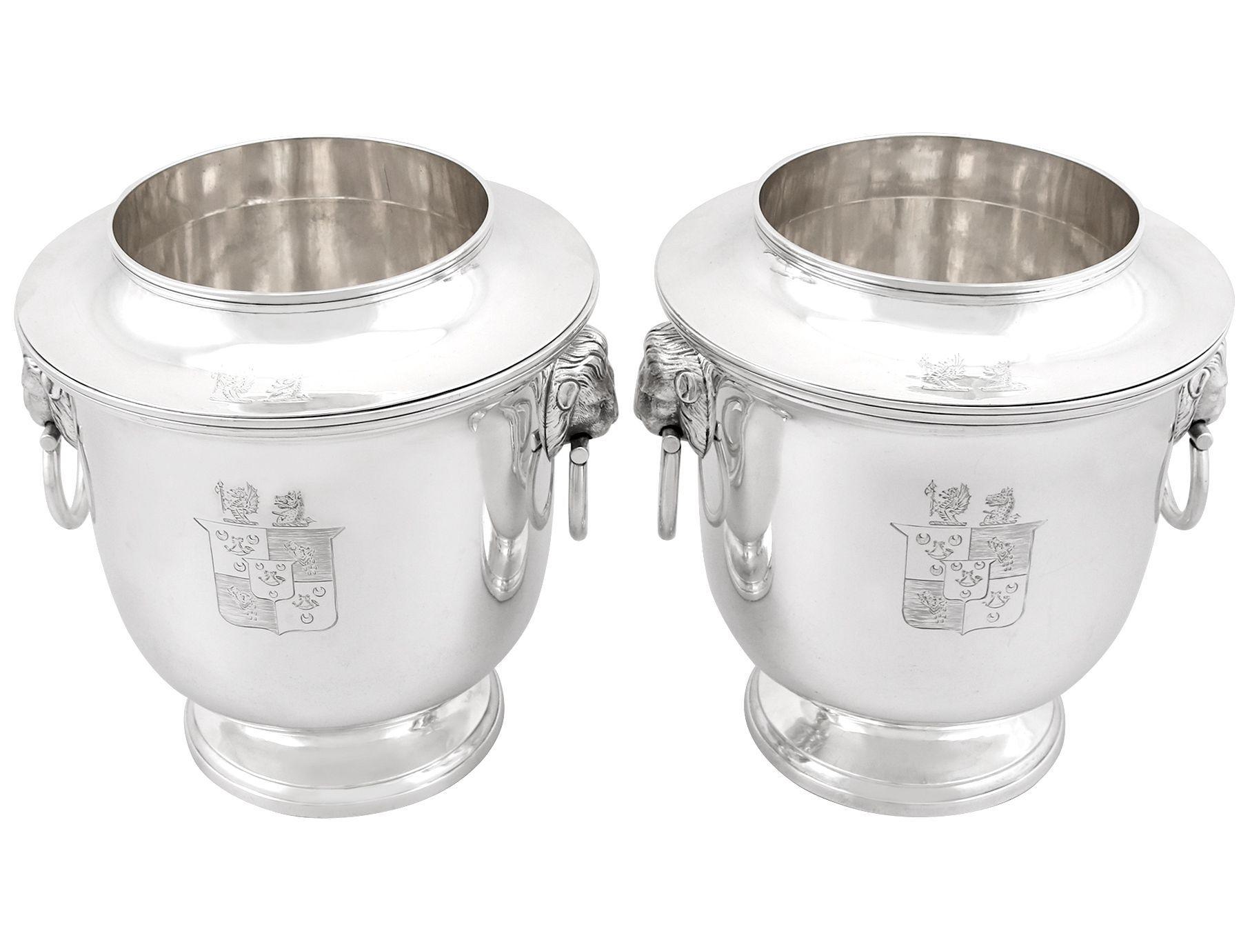 An exceptional, fine and impressive pair of antique Georgian English sterling silver wine coolers; an addition to our antique wine and drink related silverware collection.

These exceptional antique George III sterling silver wine coolers have a