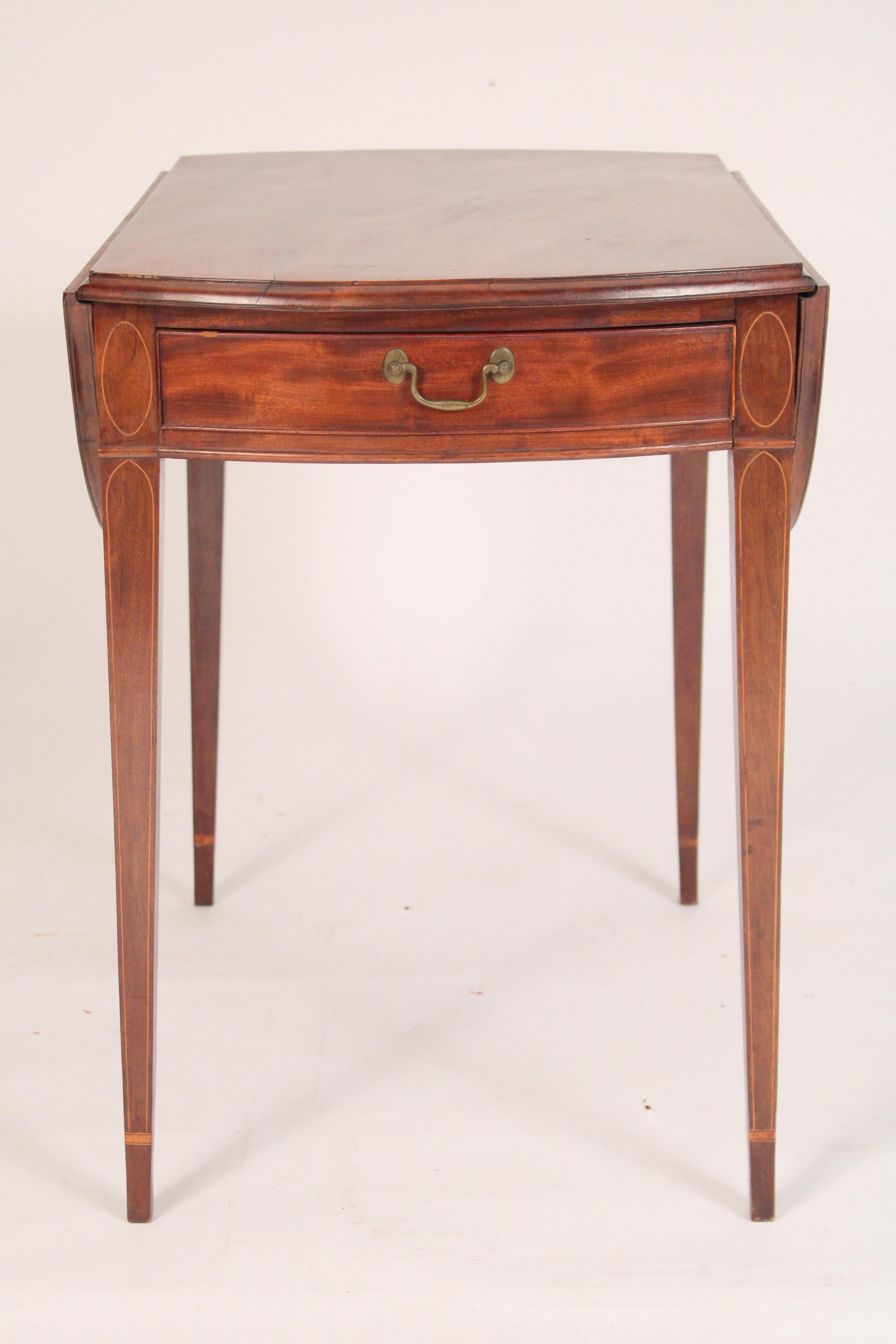 Antique George III style mahogany pembroke table, 19th century. With well figured mahogany top and D shaped drop leaves, a frieze drawer  with brass pull and square tapered legs with line inlay. Hand dove tailed drawer construction. Dimension of top