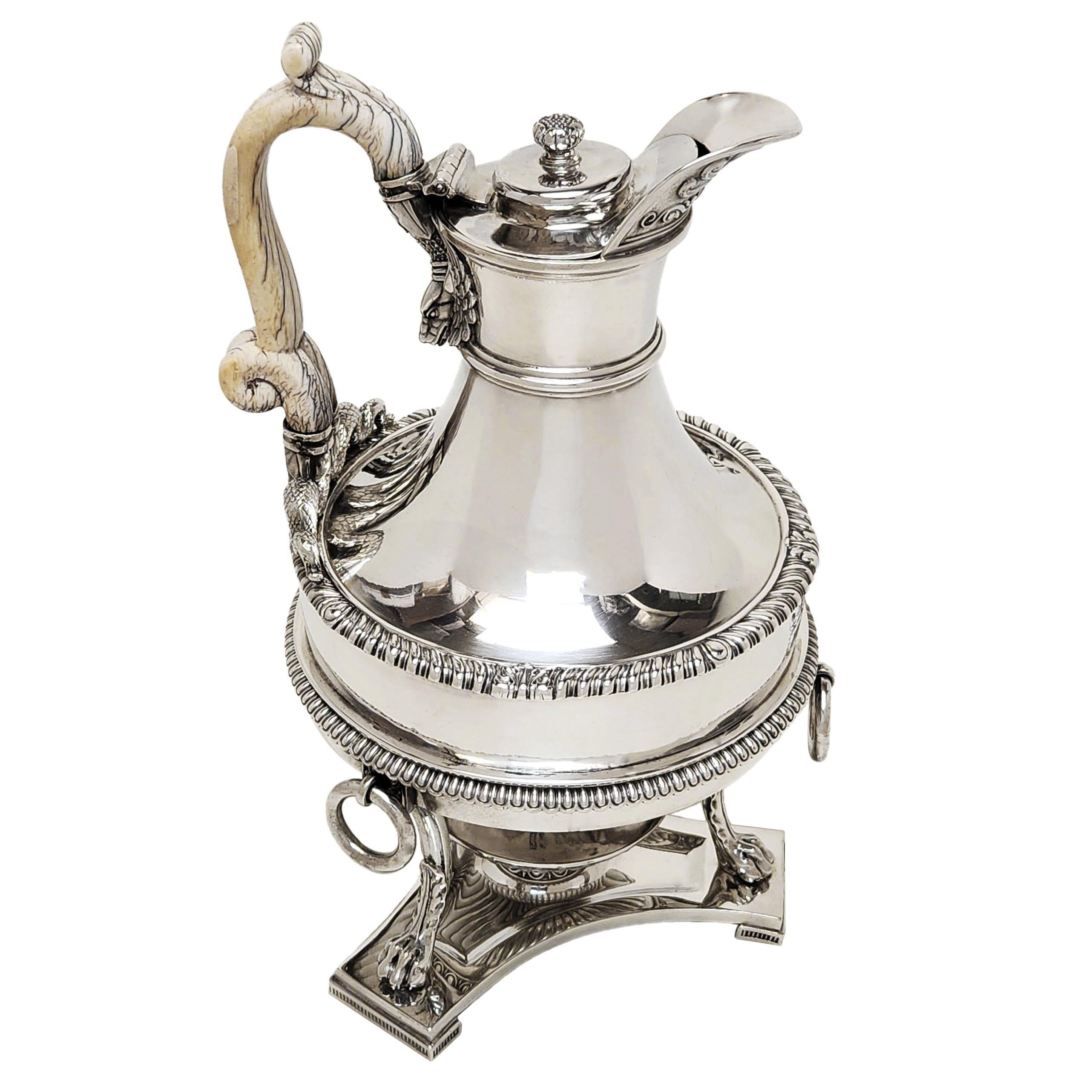 An impressive Antique Solid Silver Coffee Biggin on stand with a burner featuring design elements so iconic in the work of Paul Storr. The Silver Biggin has a magnificent bone handle in the style of a serpent with a snakes head and tails on either