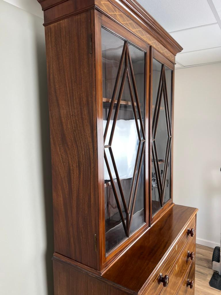 English Antique George IV Mahogany Stepback Bookcase c. 1830 For Sale