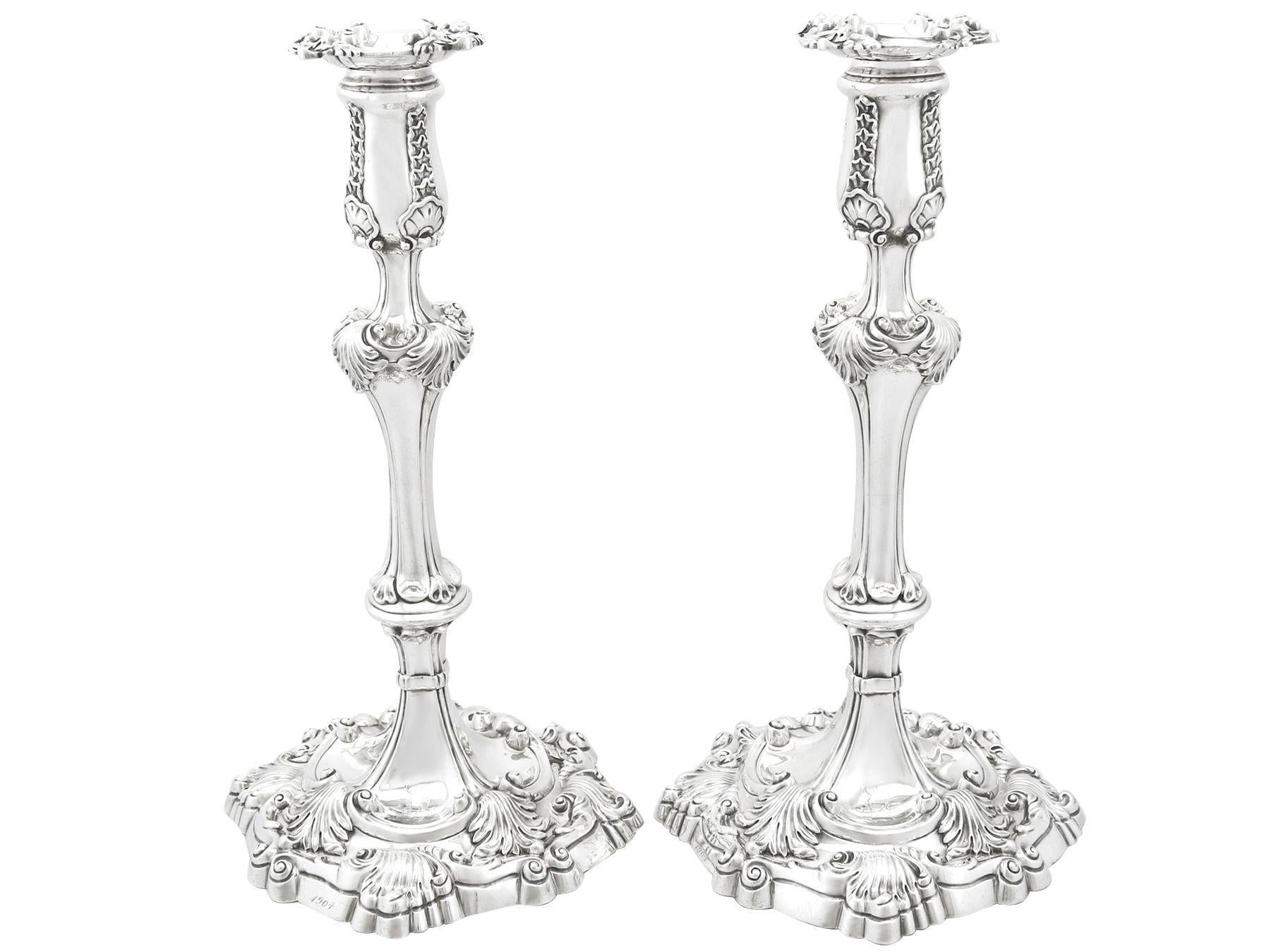 A magnificent, fine and impressive pair of antique George IV English cast sterling silver candlesticks made by Robert Garrard II; an addition of our ornamental silverware collection

These magnificent antique George IV cast sterling silver
