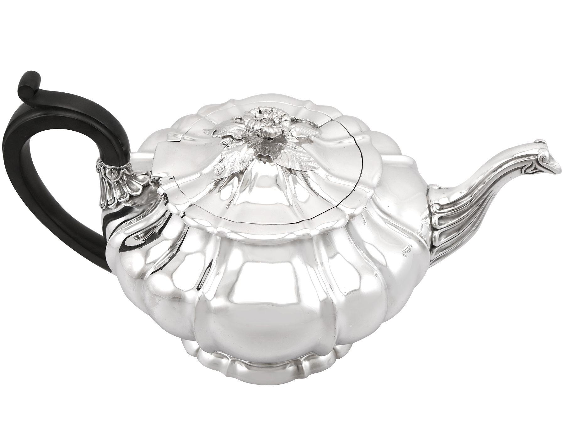 An exceptional, fine and impressive antique George IV English sterling silver teapot made by Paul Storr; an addition to our antique silver teaware collection.

This exceptional antique George IV sterling silver teapot has a circular pumpkin shaped