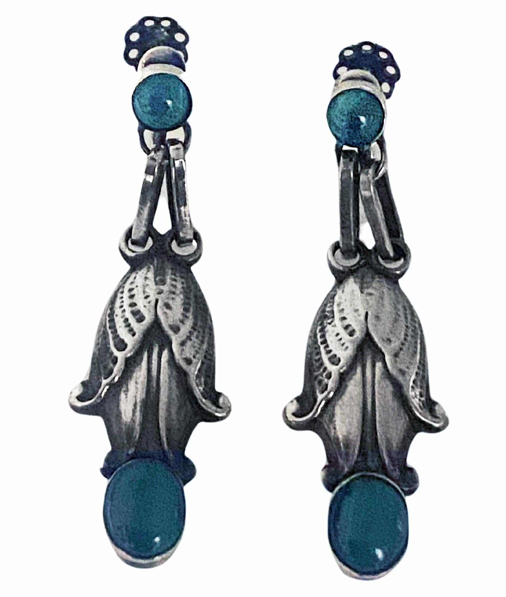 Rare Antique George Jensen Sterling Malachite drop Earrings No 28 C.1935. Wonderful rare design bezel set at top with round cabochon malachite and below with oval cabochon malachite. Original patina, original screw back fitments and full Georg