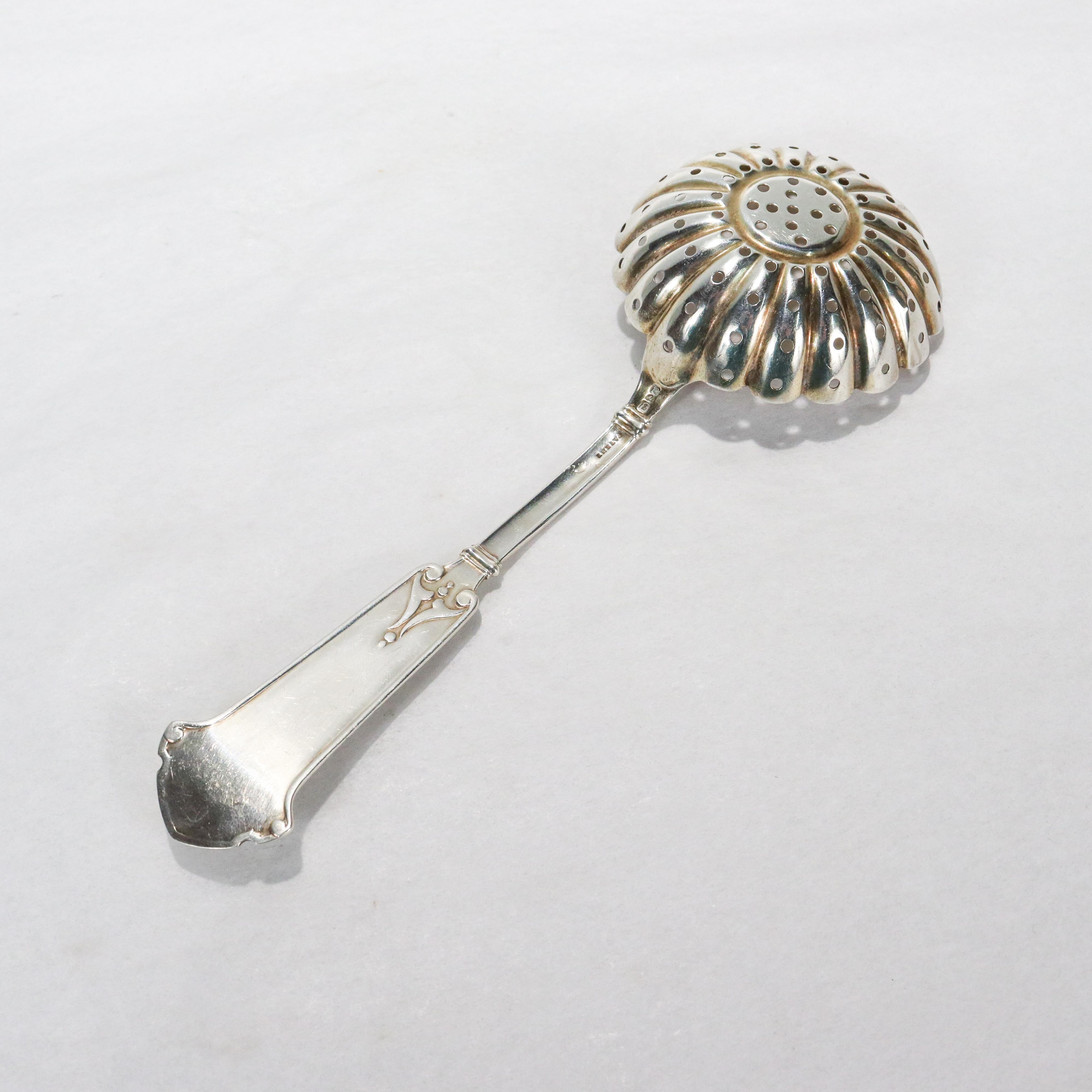 antique sugar sifter spoon
