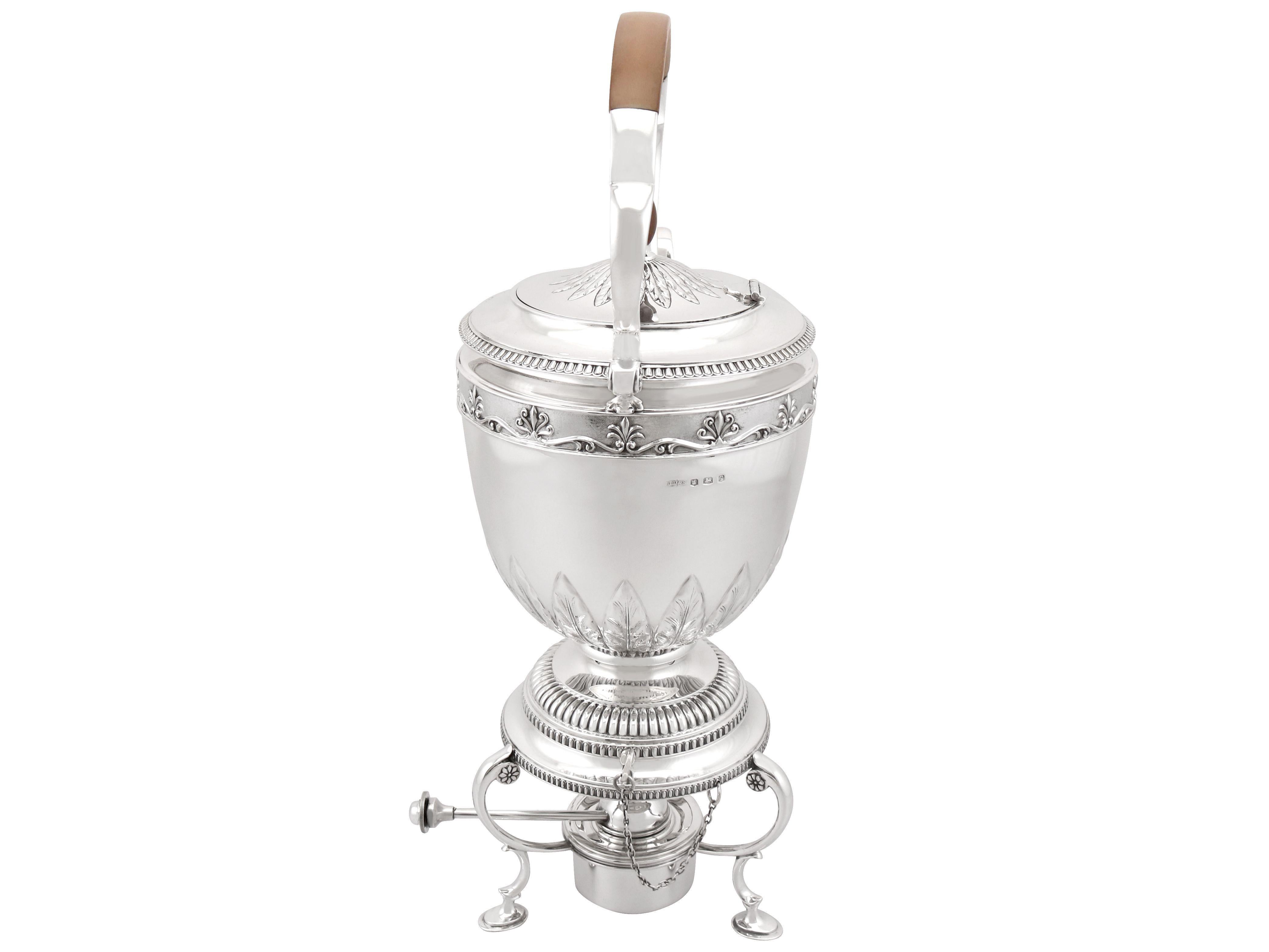 An exceptional, fine and impressive antique George V English sterling silver spirit kettle; an addition to our antique silver teaware collection

This exceptional antique George V sterling silver spirit kettle has a circular rounded form.

The