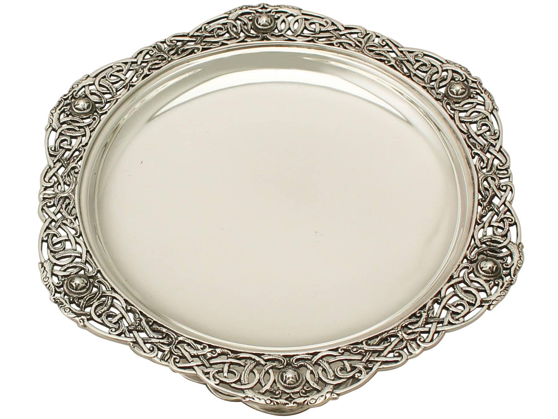 An exceptional, fine and impressive antique George V Irish sterling silver tazza in the Lindisfarne style; an addition to our ornamental silverware collection.

This exceptional antique George V Irish silver tazza has a circular shaped form onto a