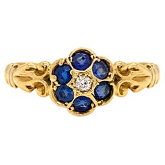 Bague antique George V à motif floral, sertie de saphirs et de diamants, en or jaune 18 carats, 1918