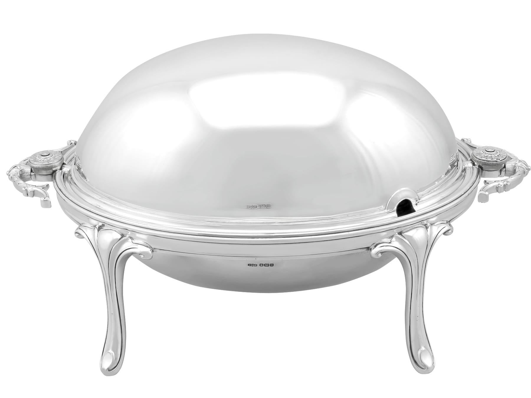 An exceptional, fine and impressive antique George V sterling silver roll top breakfast dish; an addition to our 20th century silverware collection.

This exceptional antique George V sterling silver breakfast dish has an oval domed shaped