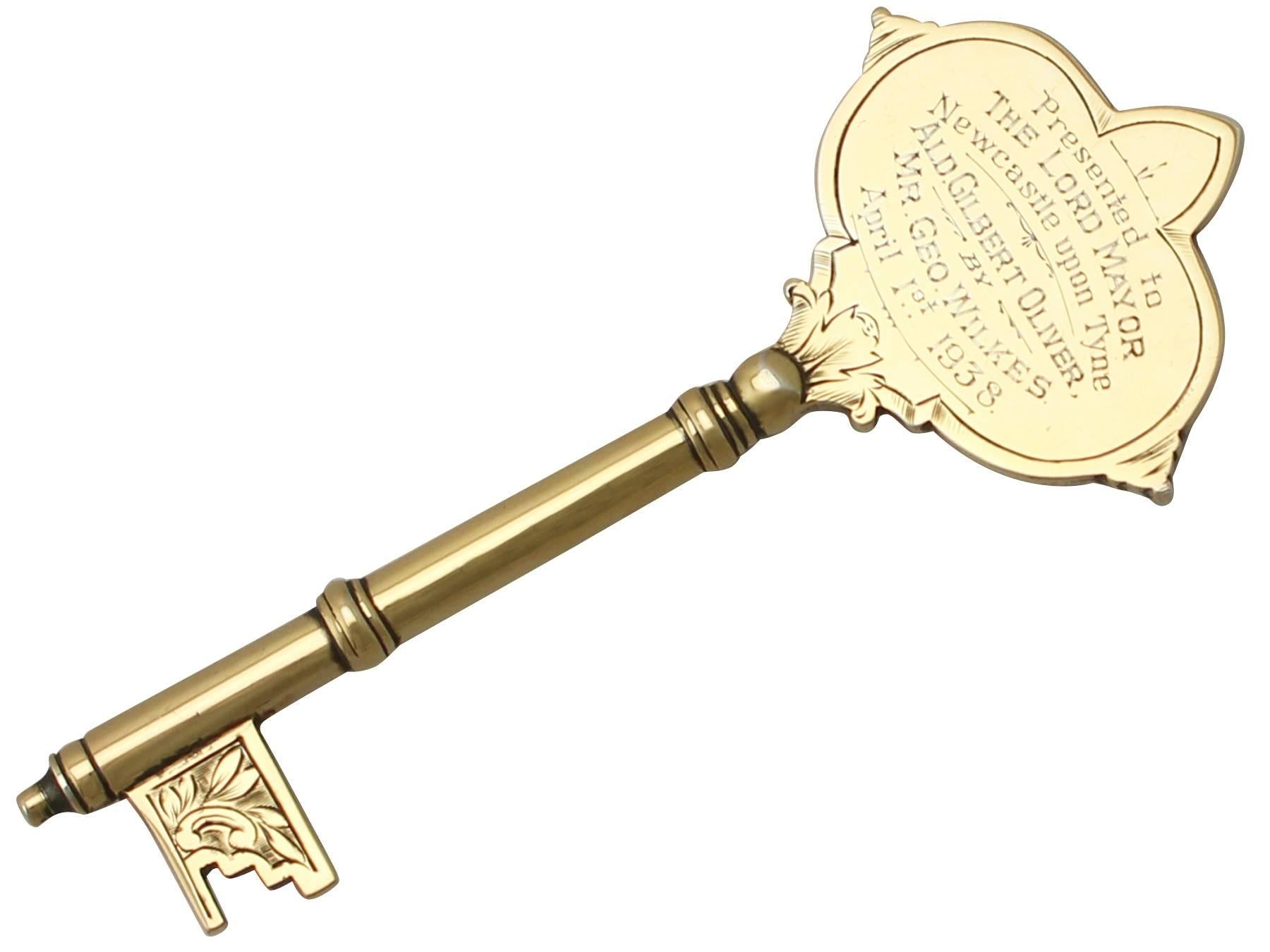An exceptional, fine and impressive antique George V English sterling silver ceremonial/presentation key, an addition to our ornamental presentation collection.

This exceptional antique George V sterling silver presentation key has a rounded