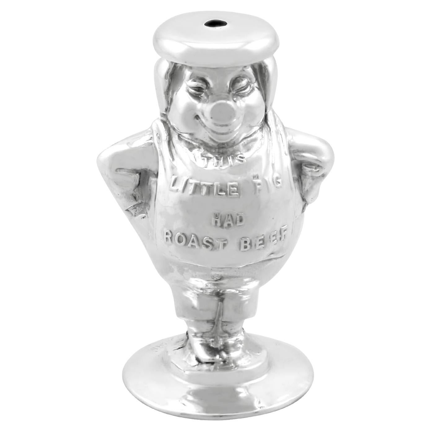 Sal de cerdito con rima infantil de plata de ley Jorge V (1911) en venta