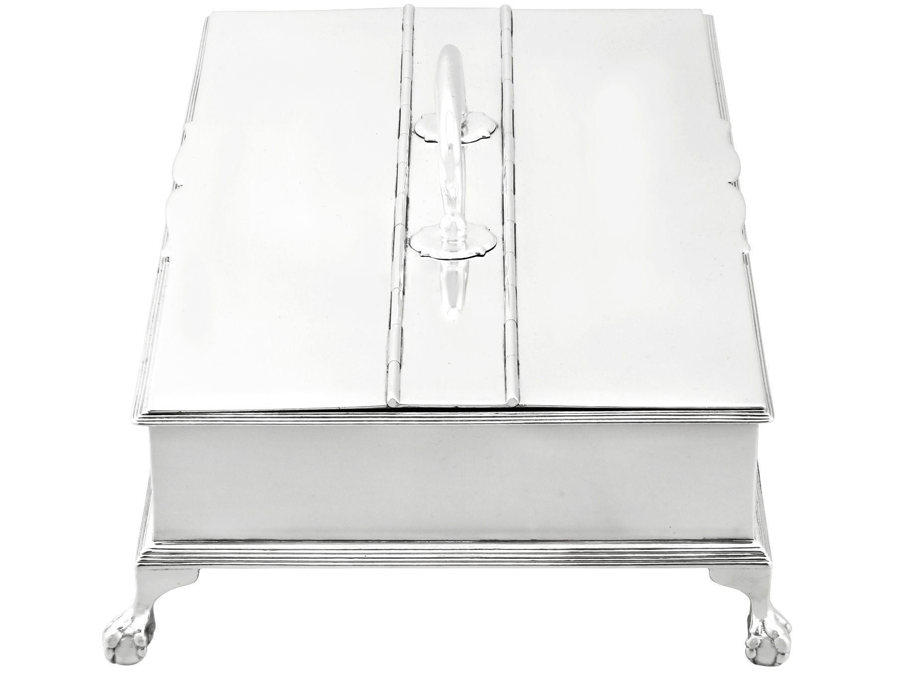An exceptional, fine and impressive antique George VI English sterling silver treasury inkstand; an addition to our ornamental silverware collection

This exceptional antique George VI sterling silver treasury inkstand has a rectangular