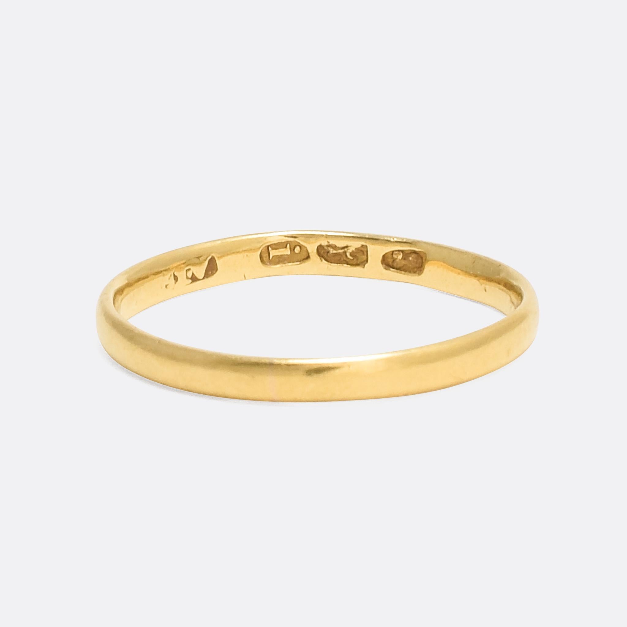 A fine Georgian wedding band, clearly hallmarked for 18k gold and the year 1824. These early wedding bands particularly well made, and are getting difficult to find.

RING SIZE
6.25 US

MEASUREMENTS
Width of band: 2.0mm

WEIGHT
1.6g

MARKS
English