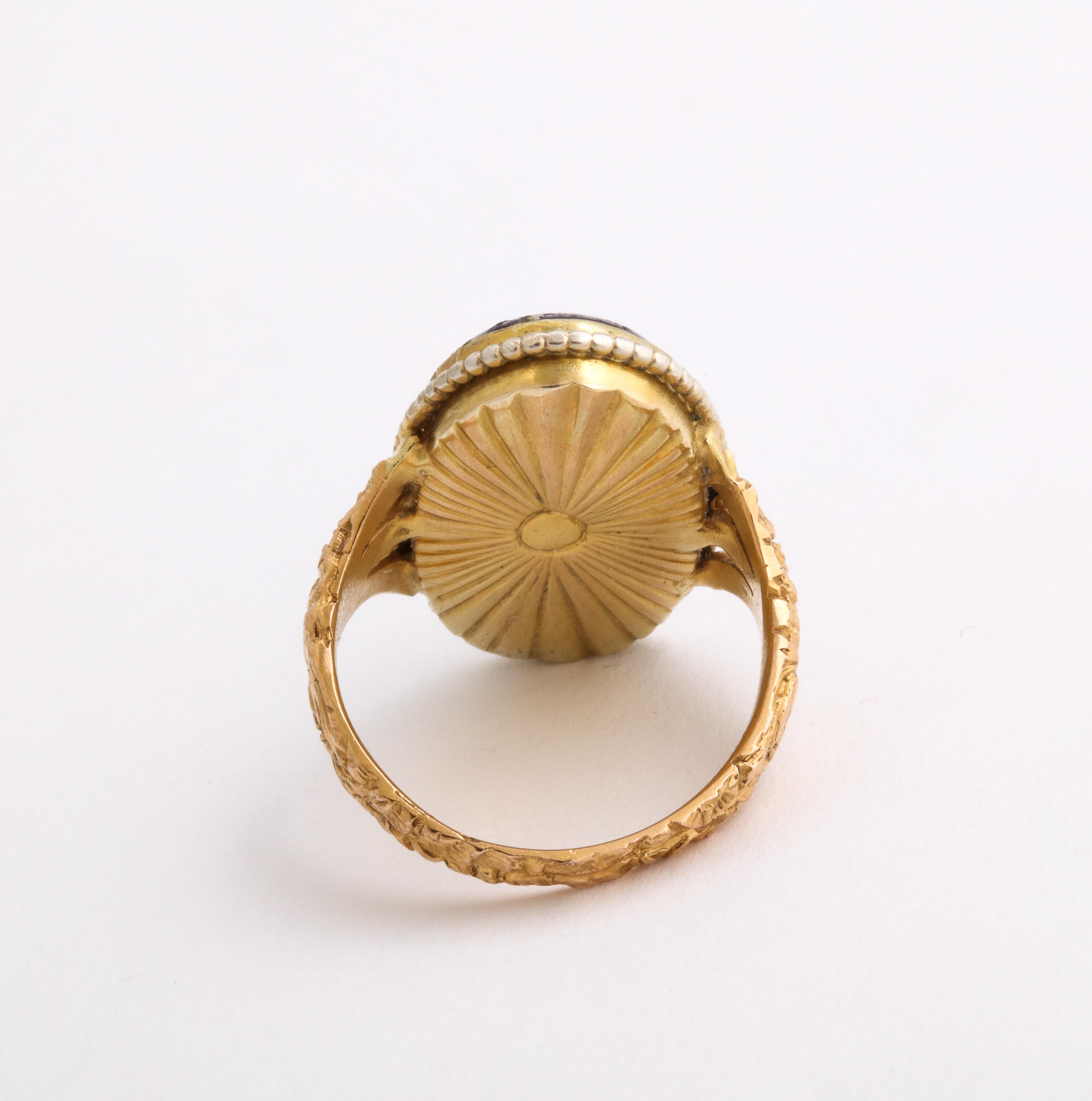 18kt ge with diamond symbol ring