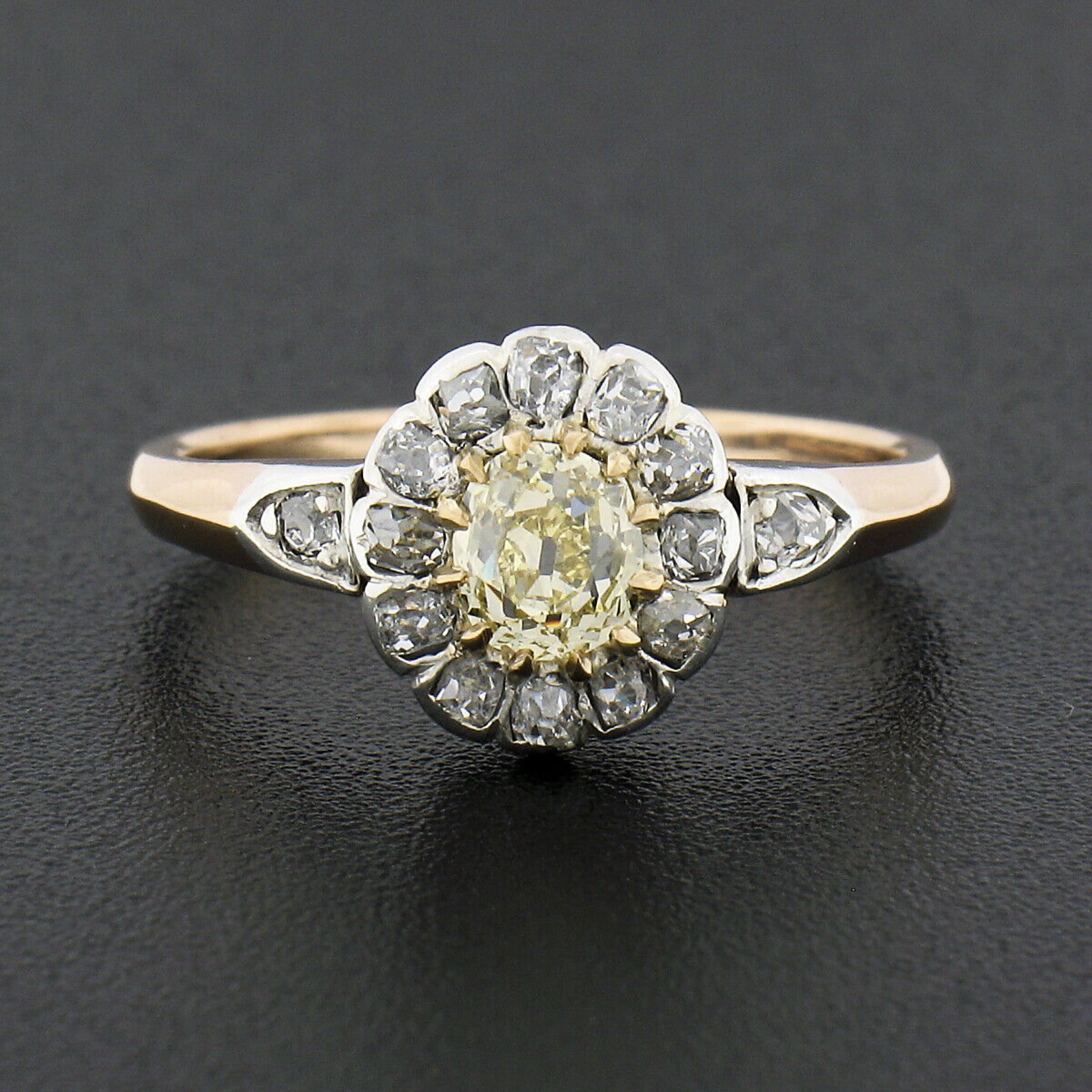 This truly gorgeous antique ring was crafted during the Georgian era from solid 18k gold with a silver top. It features a lovely flower cluster design set with a, GIA certified, natural fancy light yellow diamond at its center. This gorgeous center