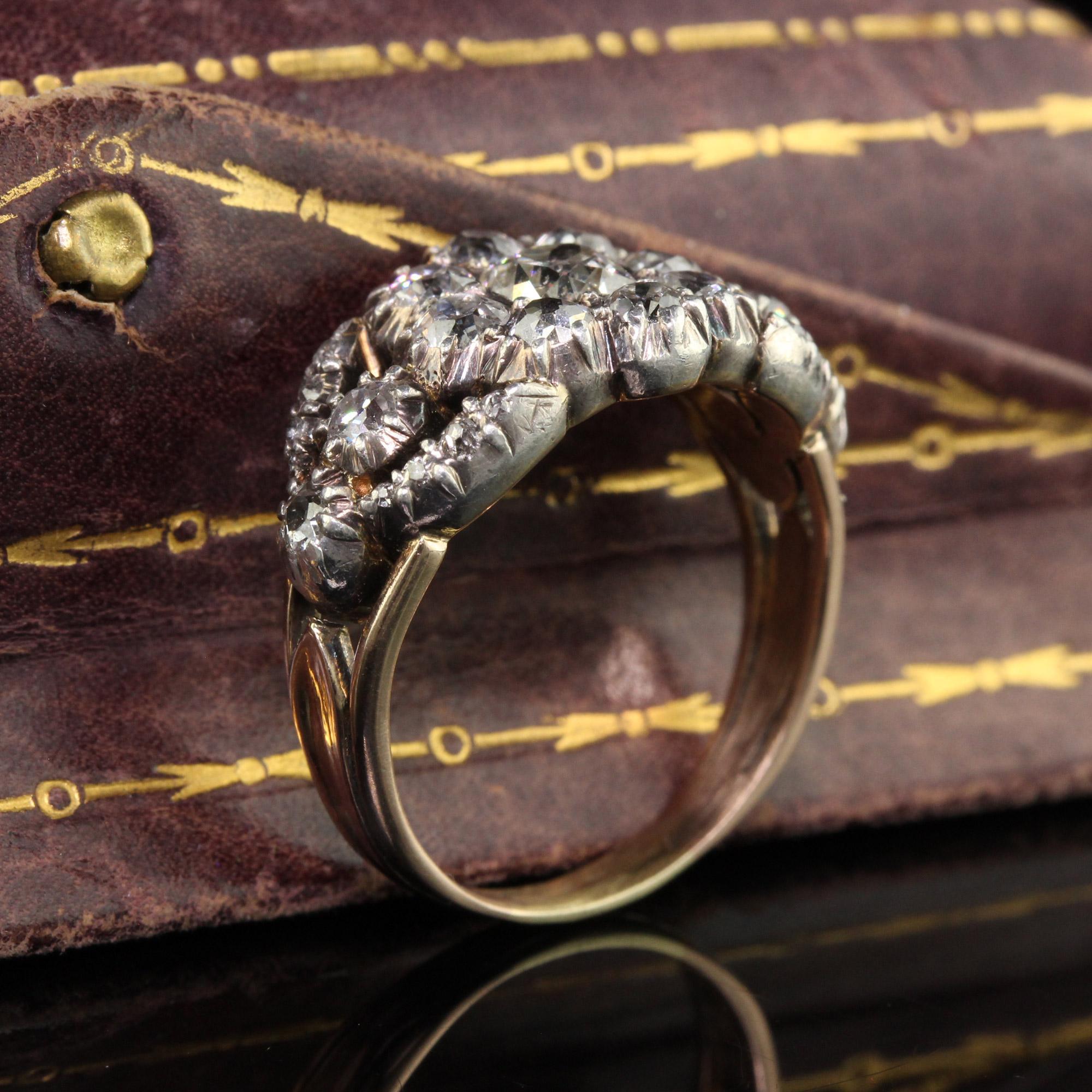 Beautiful Antique Georgian 18K Gold Silver Top Old Mine Diamond Cluster Engagement Ring. This incredible Georgian engagement ring is crafted in 18k yellow gold and silver top. The center holds a gorgeous old mine cut diamond with mirror like facets
