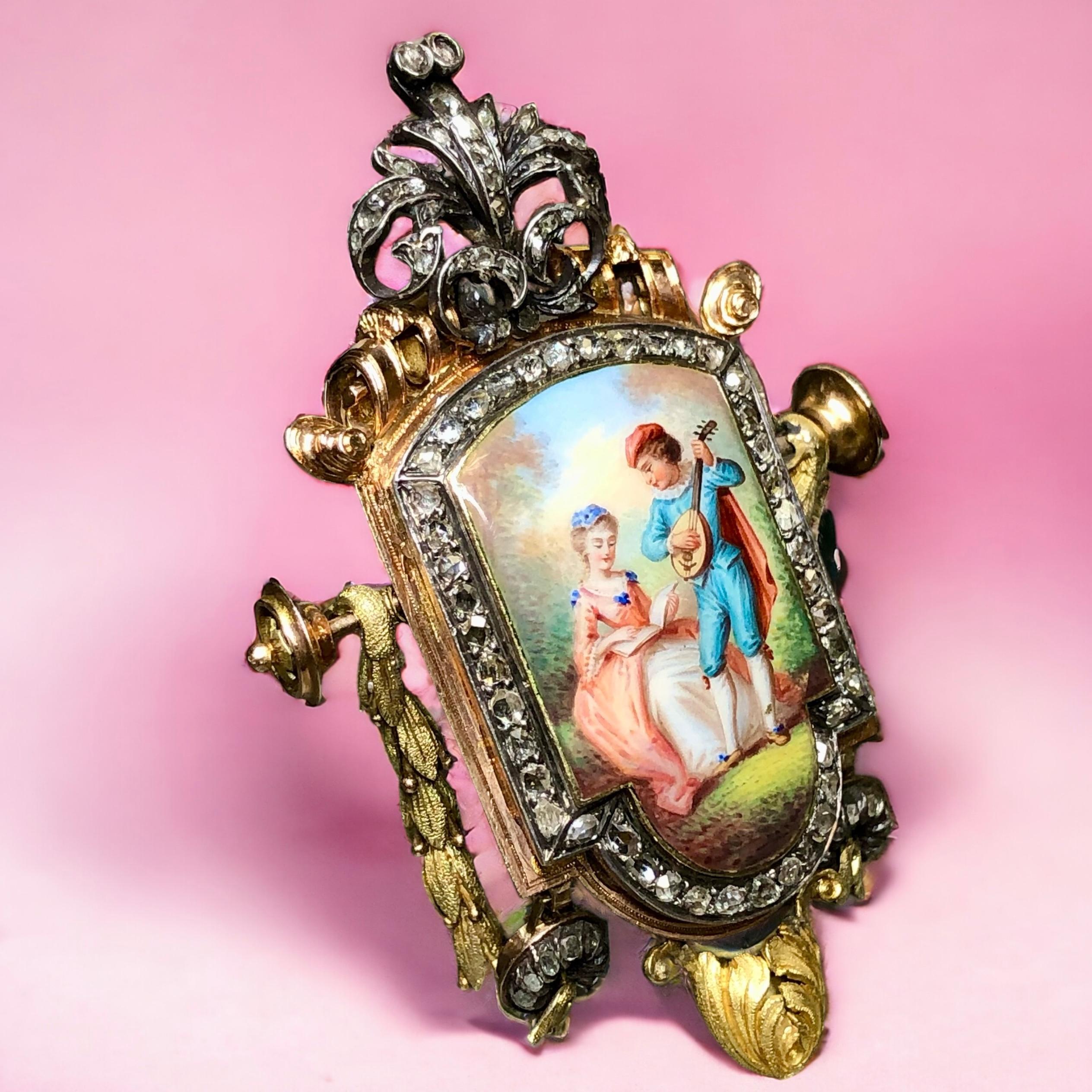 A beautifully preserved piece of jewelry history. This original Georgian period brooch has been done in 18K multi-toned gold and silver topped in sections set with rose and peruzzi cut diamonds. Side section tassels are attached to the piece but do