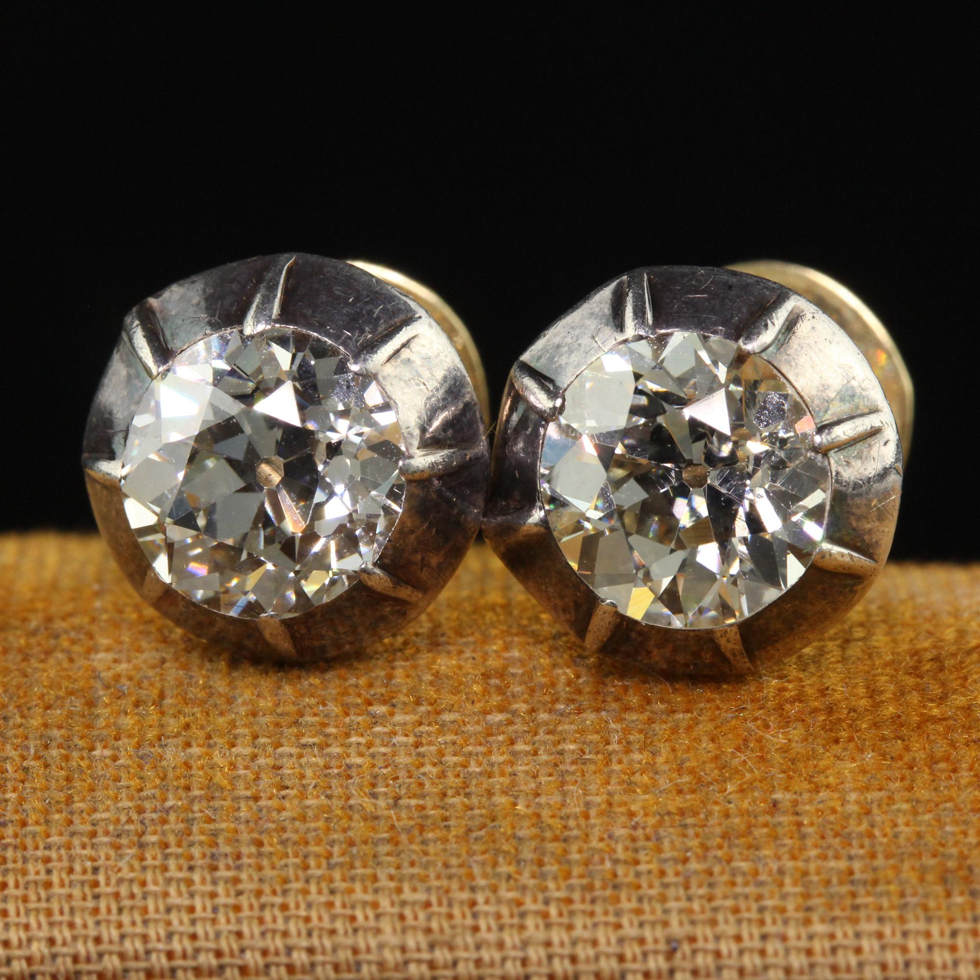 Beautiful Antique Georgian 18K Yellow Gold and Silver Top Old Mine Diamond Stud Earrings. This gorgeous pair of diamond studs are crafted in 18k yellow gold and silver. The stud earrings have two beautiful old cut diamonds set in a gorgeous mounting