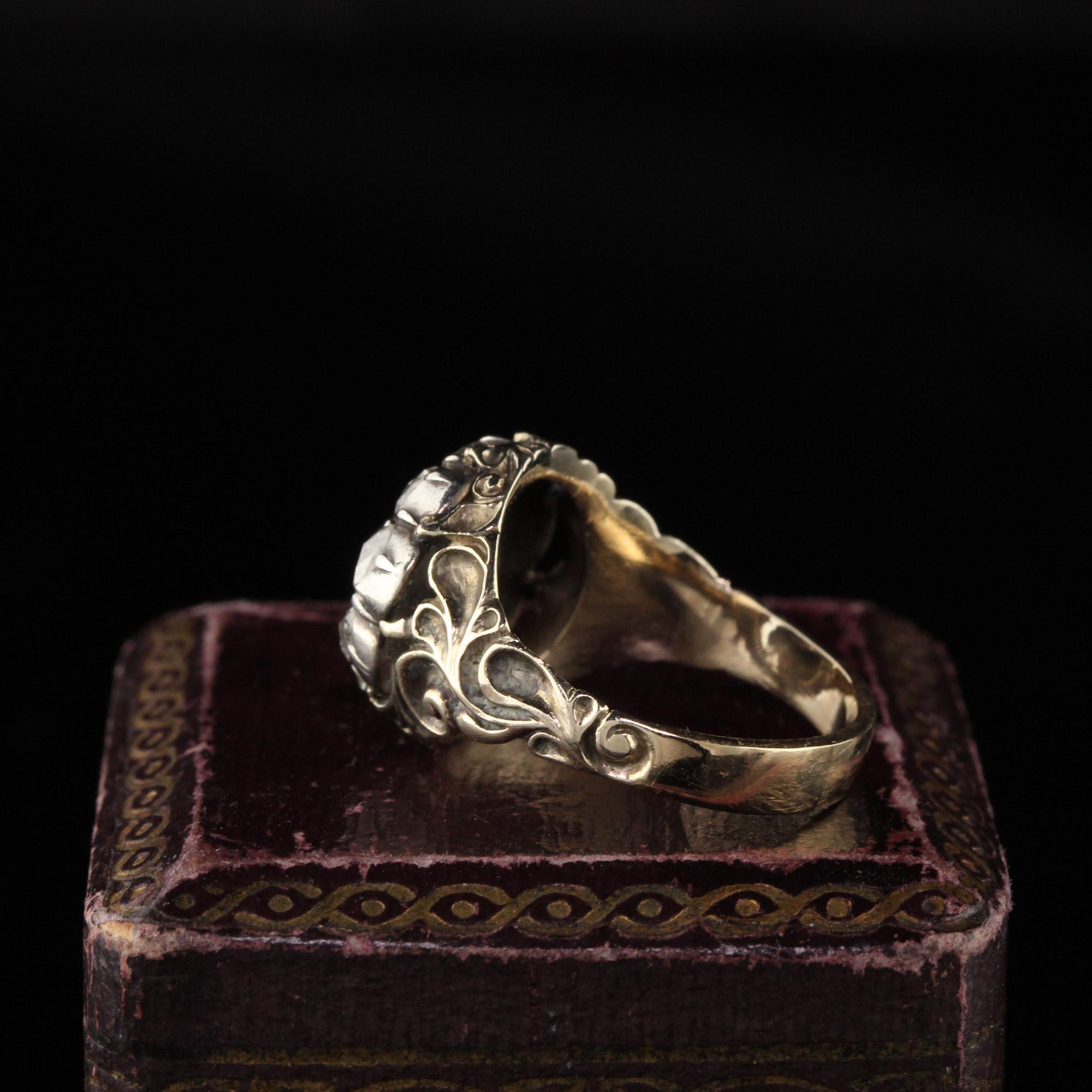 Beautiful antique engagement ring with rose cut diamonds. 

Item #R0577

Metal: 18K Yellow Gold & Silver 

Weight: 5.6 Grams

Total Diamond Weight: Approximately 2.50 cts

Diamond Color: H

Diamond Clarity: VS2

Ring Size: 7.25 

This ring can be