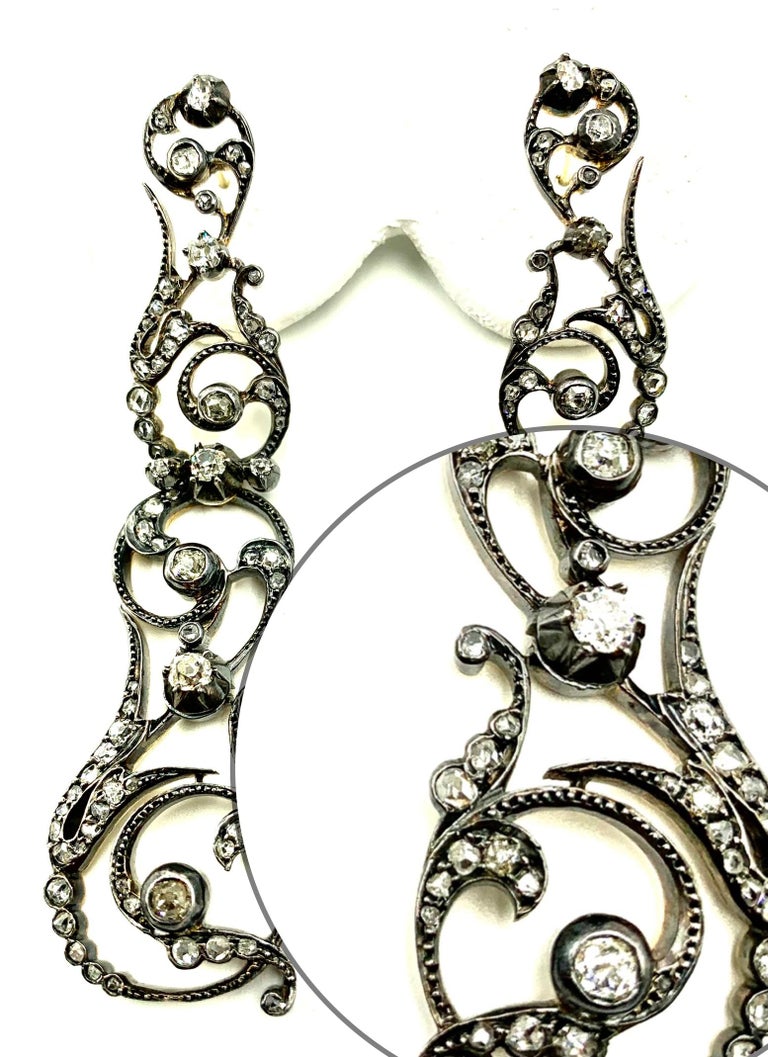The most beautiful 18th Century Georgian earrings we have seen in a very long time, museum worthy.
Elegant, very long, unusual Rococo design at its best with intricate interconnected diamond encrusted scrolls glinting mysteriously when catching the