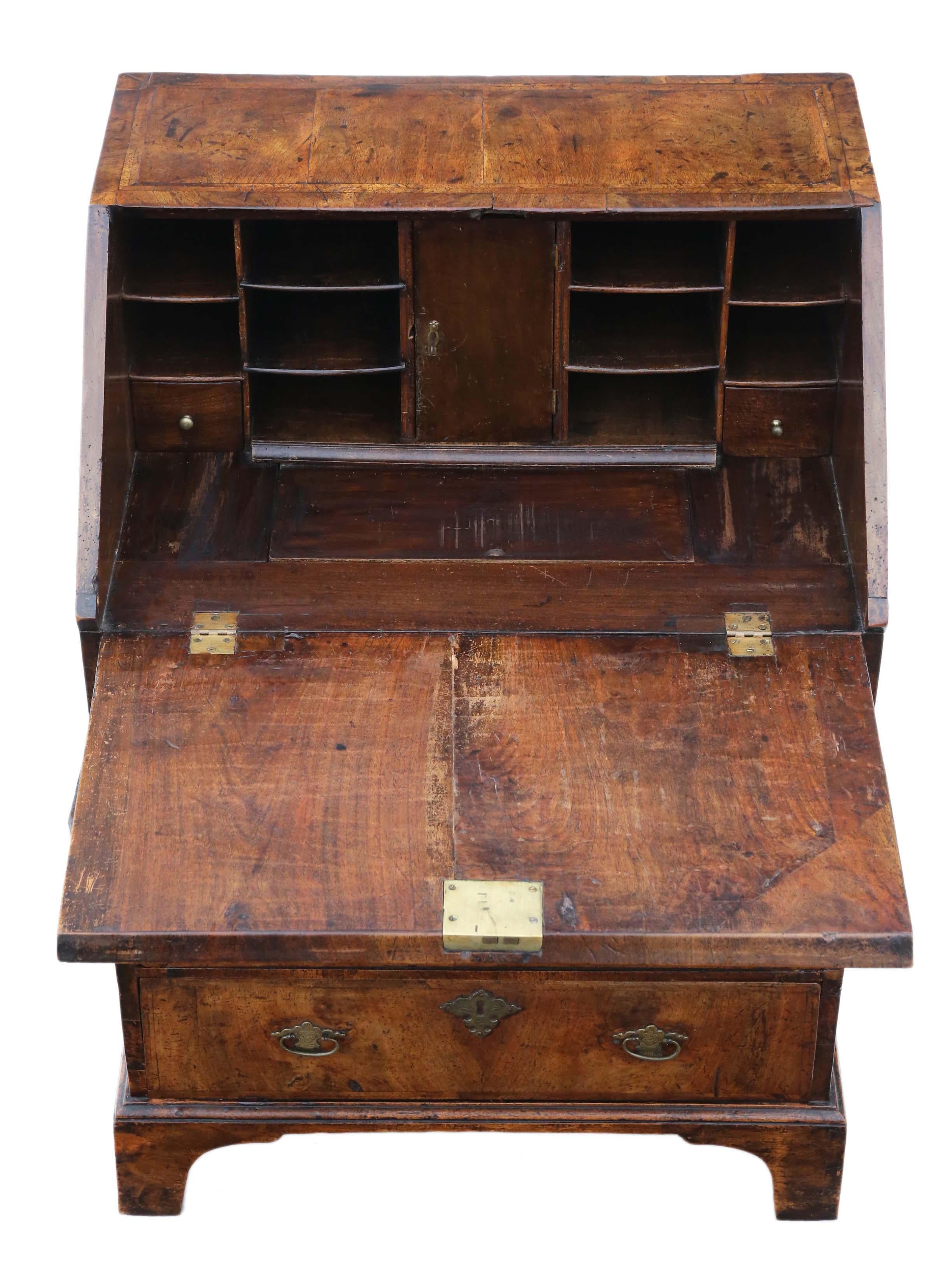 Antique Georgian Walnut and Fruitwood Drop Well Bureau Desk, Early 18th Century – a charming and characterful piece full of historical significance.

This exquisite bureau features no loose joints, and the drawers slide freely. Keys are available
