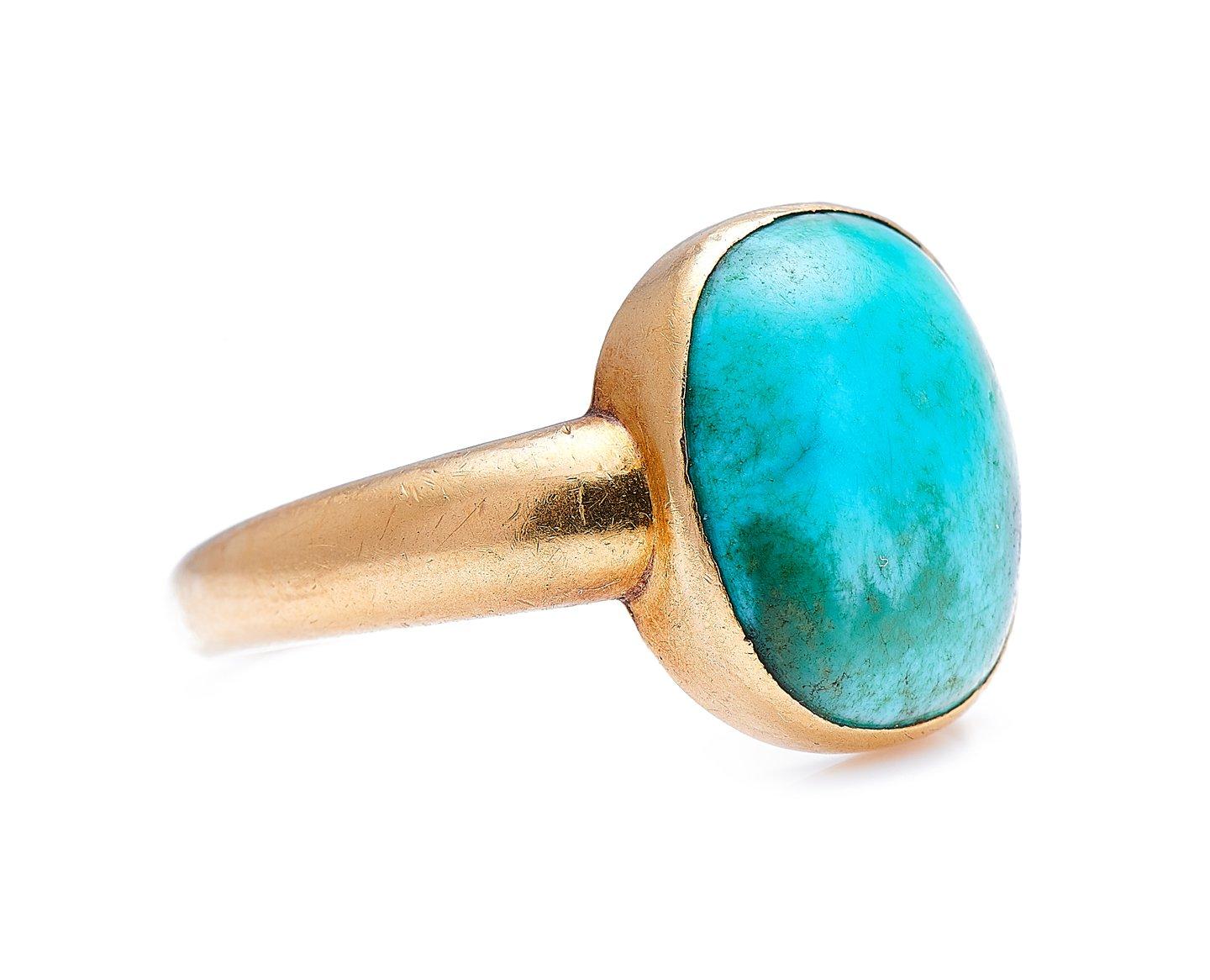 Early 19th century turquoise signet ring. A rare signet ring set with a beautiful natural turquoise in a buttery 22 carat gold setting. This ring is totally original, it looks fantastic when worn. These early rings are so rare to find these days,
